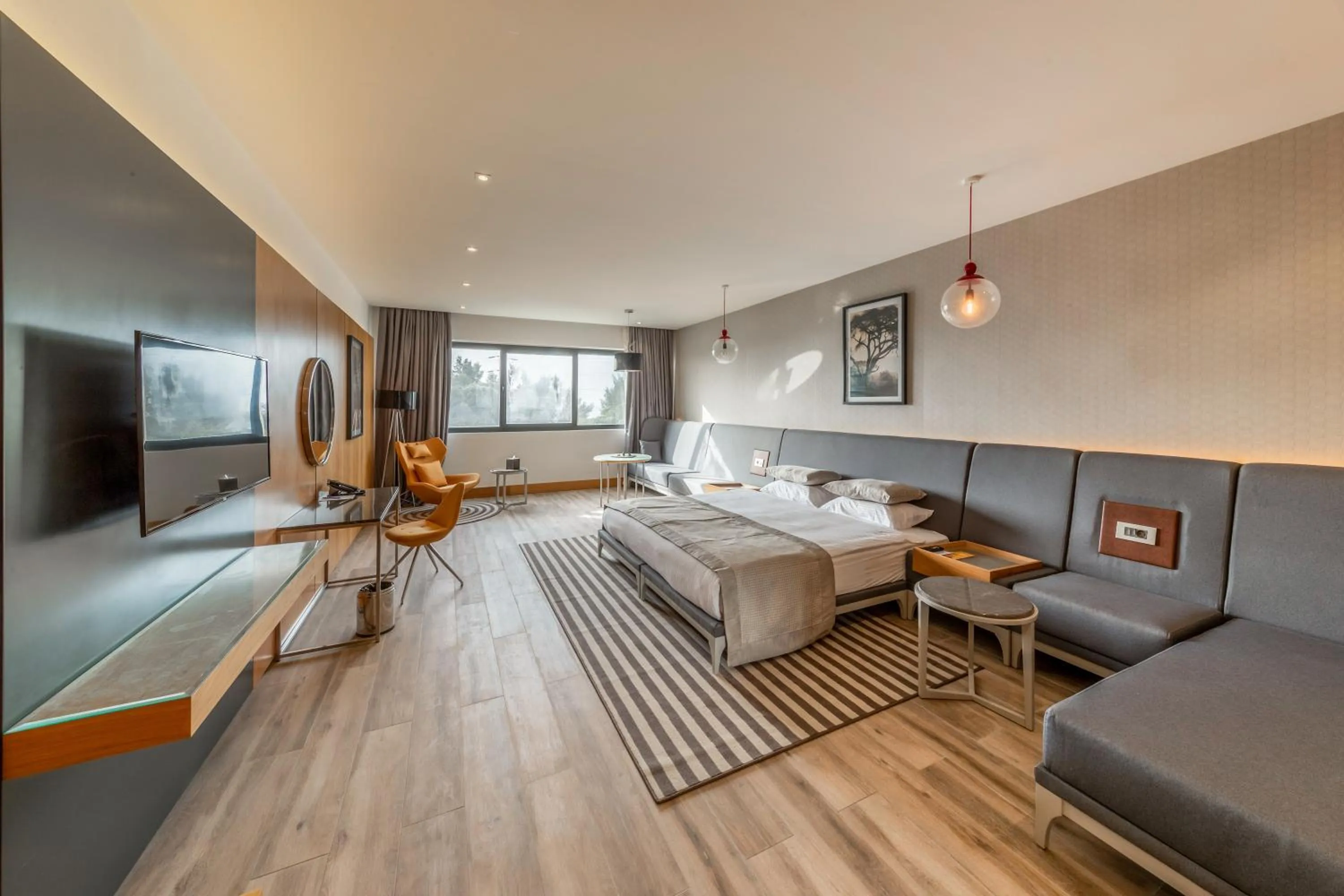 Bed in Riviera Royal Hotel