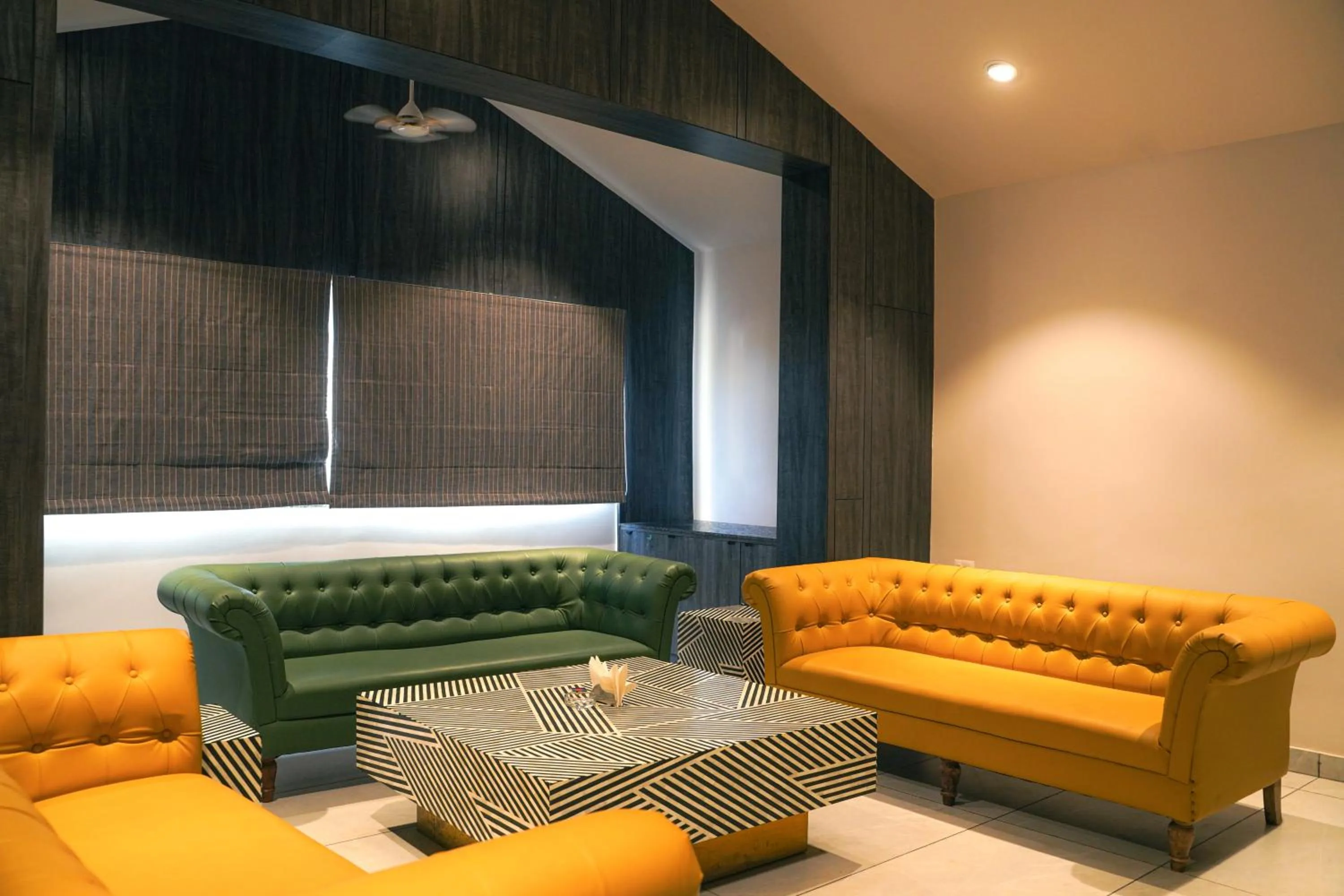 Seating area in Ariena by ABA Hotel