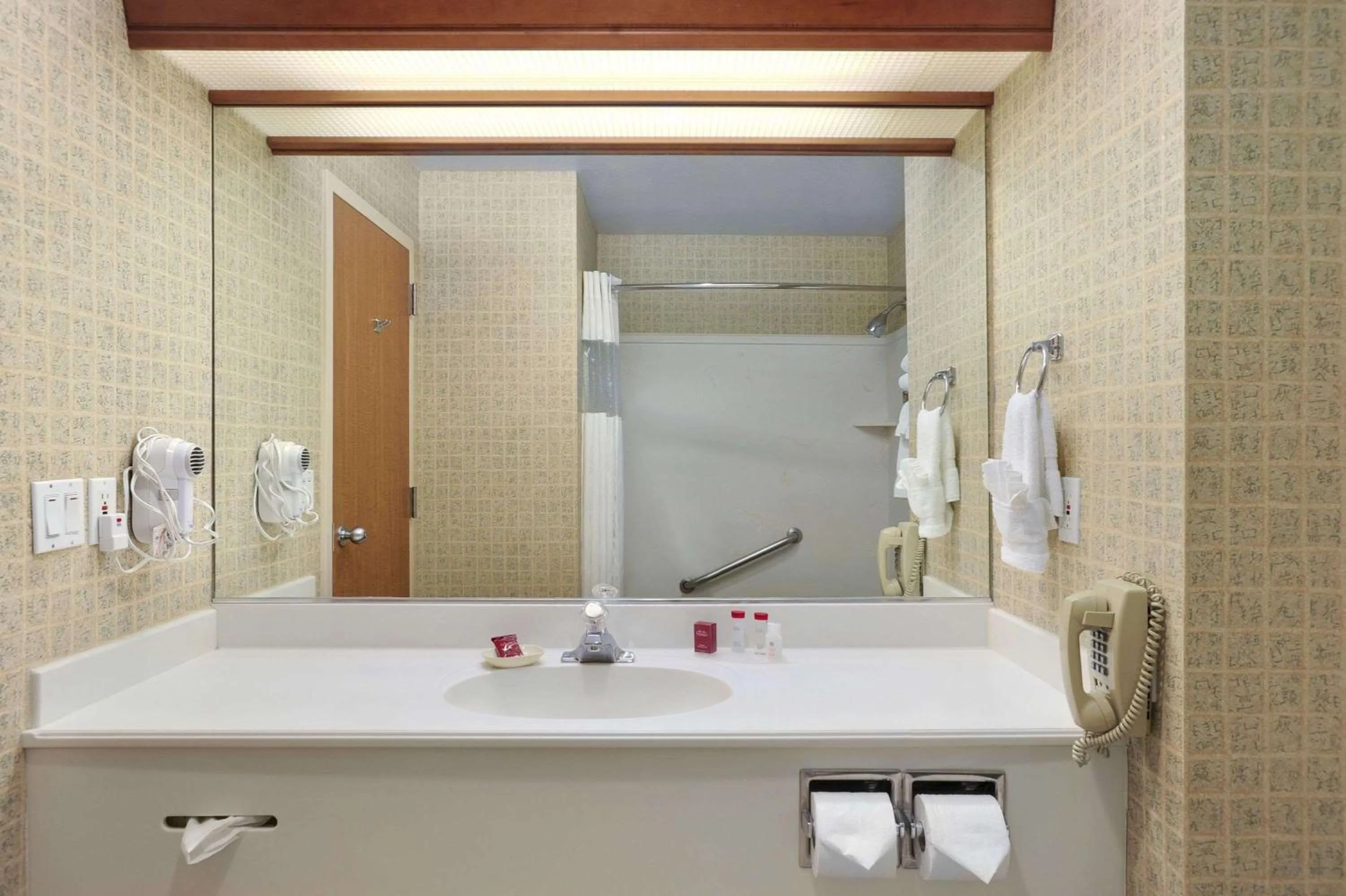 Bathroom in Ramada by Wyndham Olympia