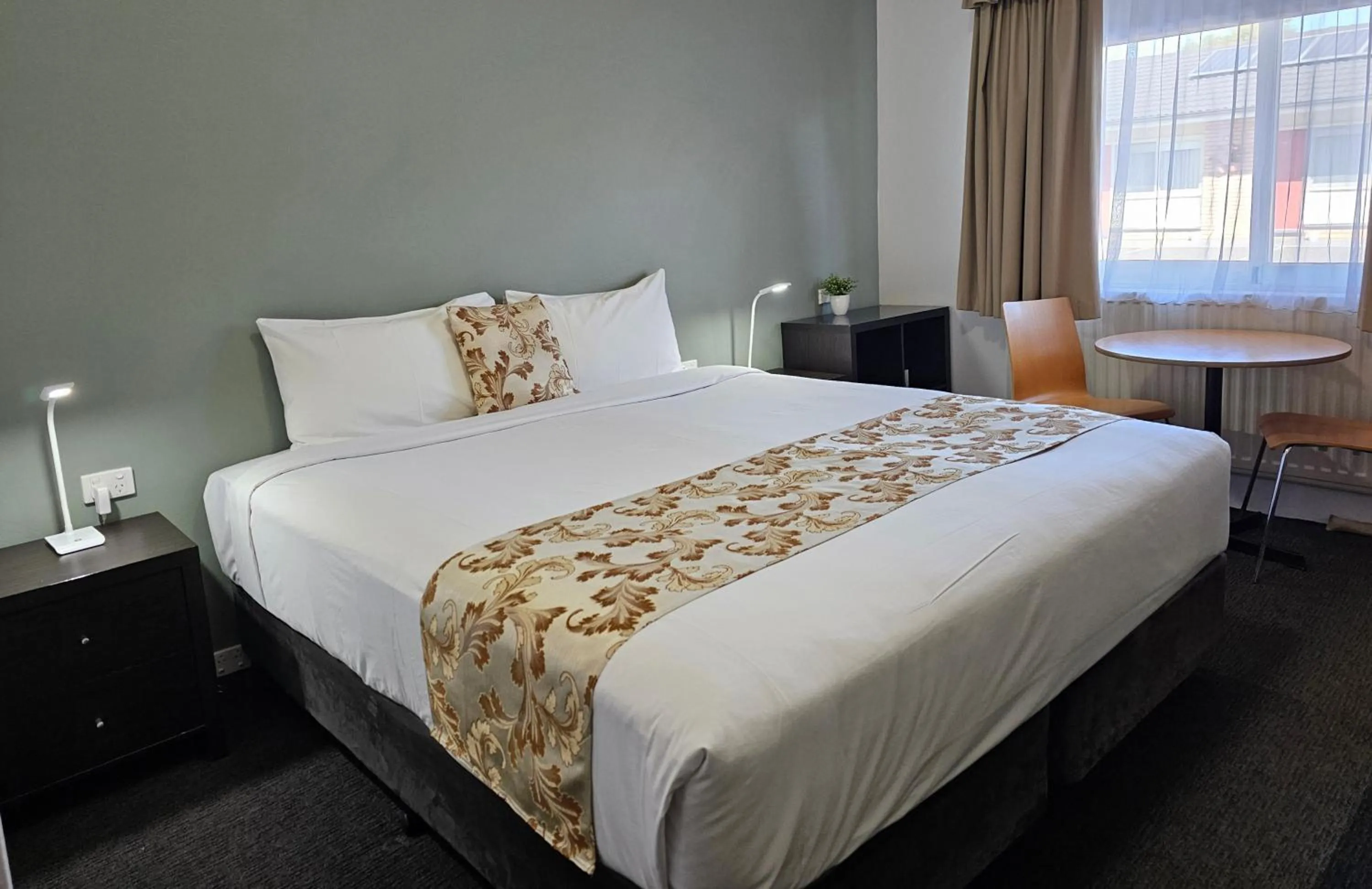 Bed in Country Lodge Motor Inn