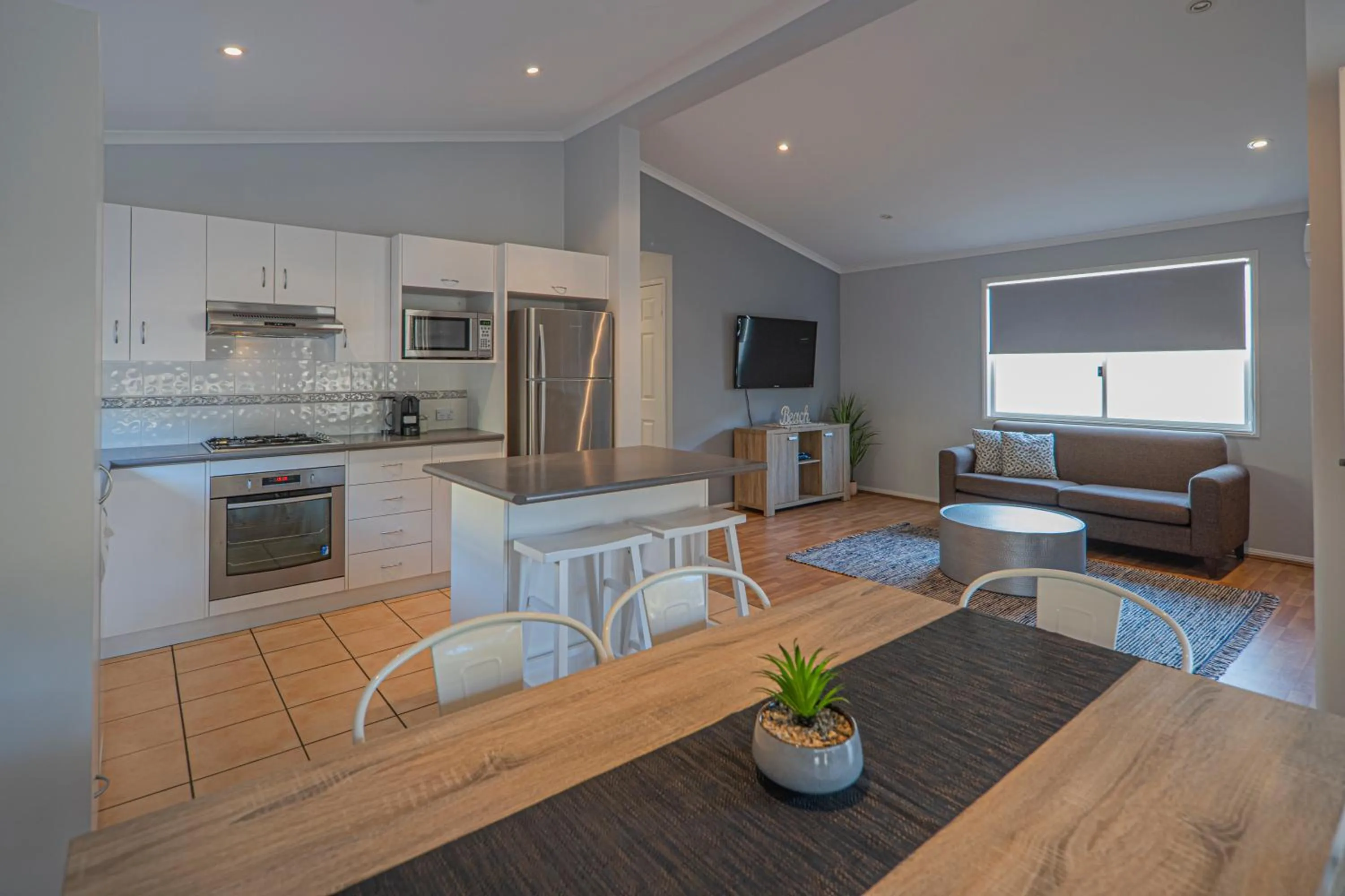 Living room in Ingenia Holidays One Mile Beach