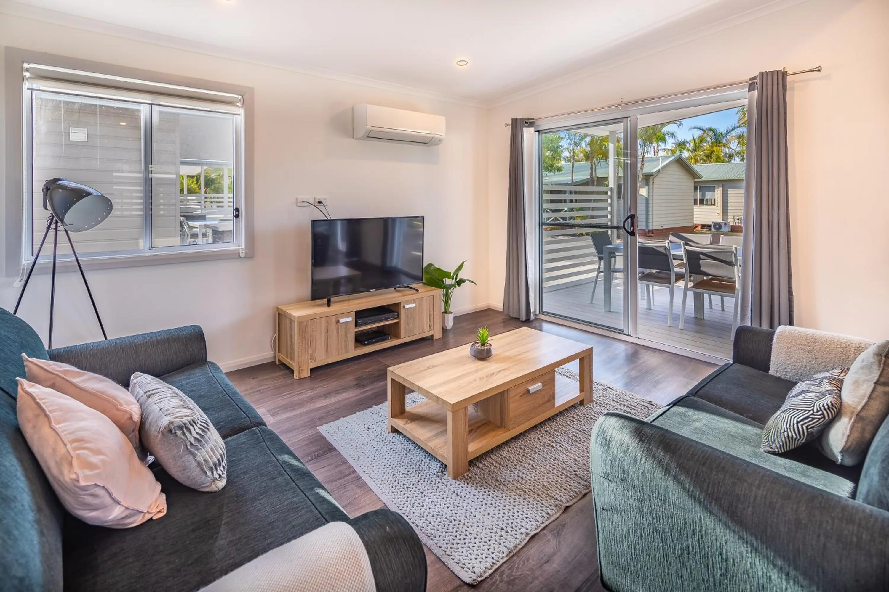 Communal lounge/ TV room in Ingenia Holidays One Mile Beach