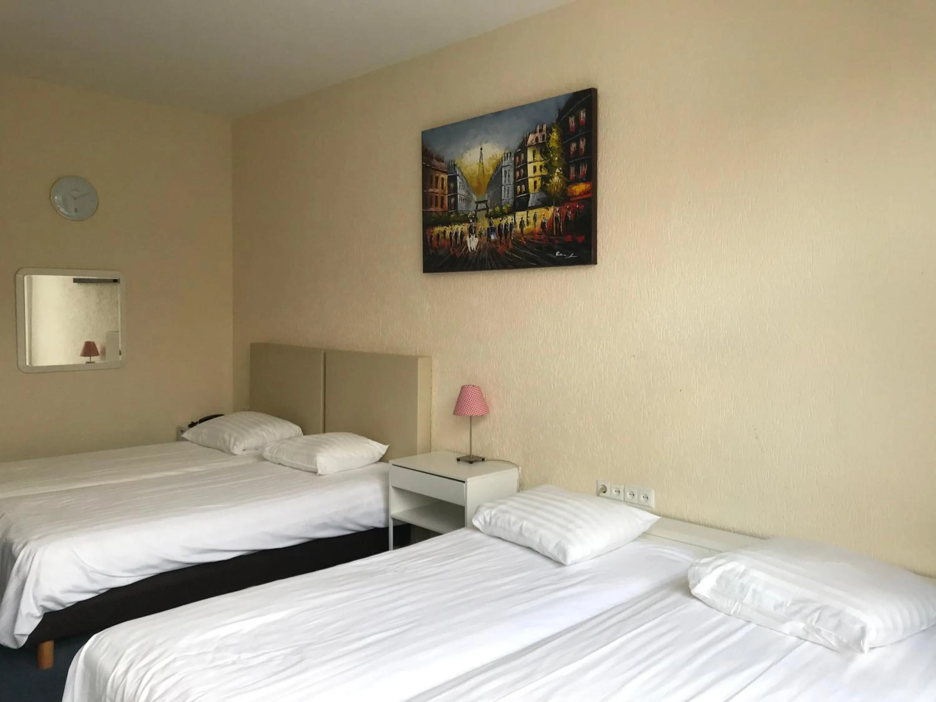 Bed in New City Hotel Scheveningen