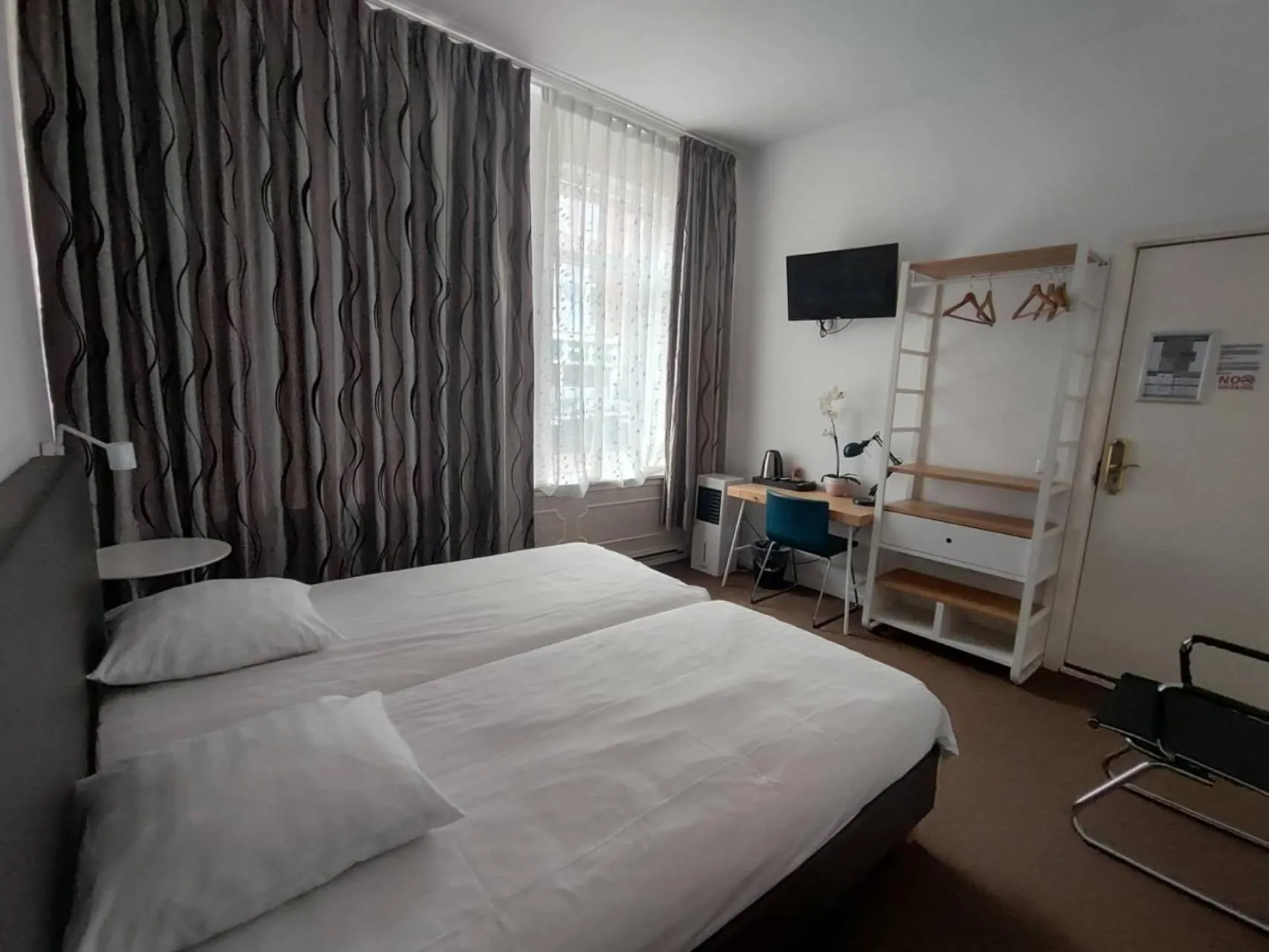 Photo of the whole room, Bed in New City Hotel Scheveningen