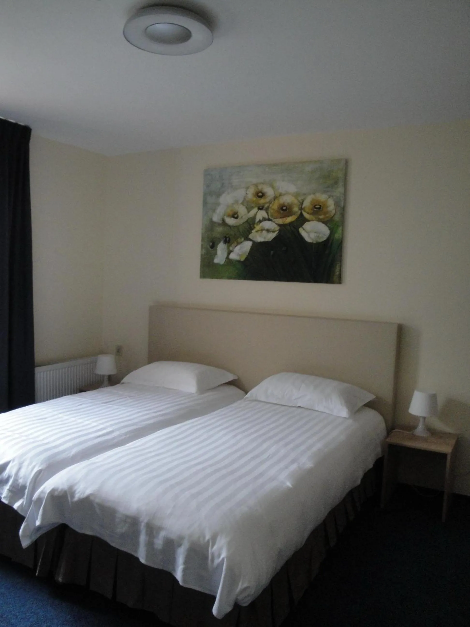 Bed in New City Hotel Scheveningen