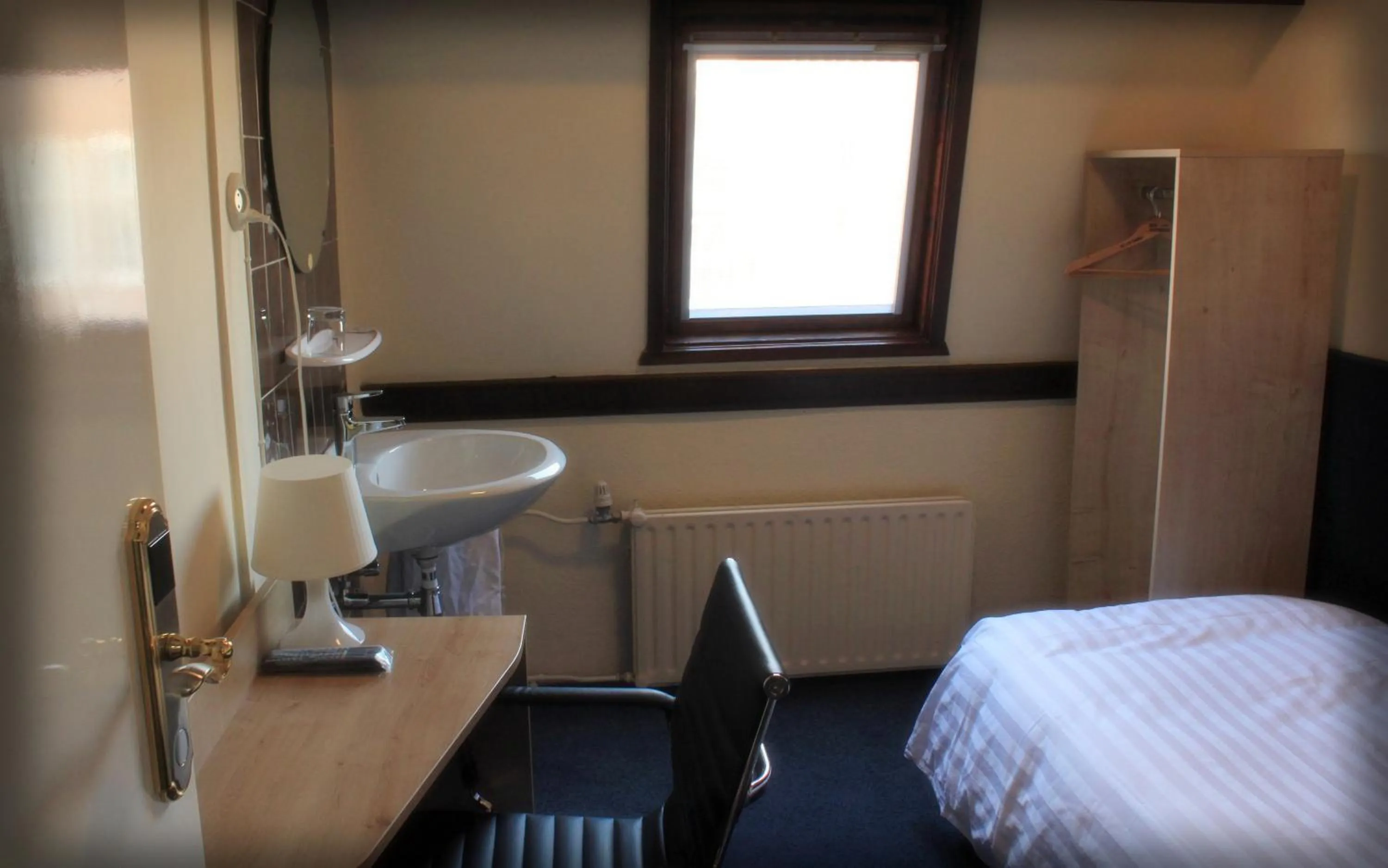 Photo of the whole room, Bed in New City Hotel Scheveningen