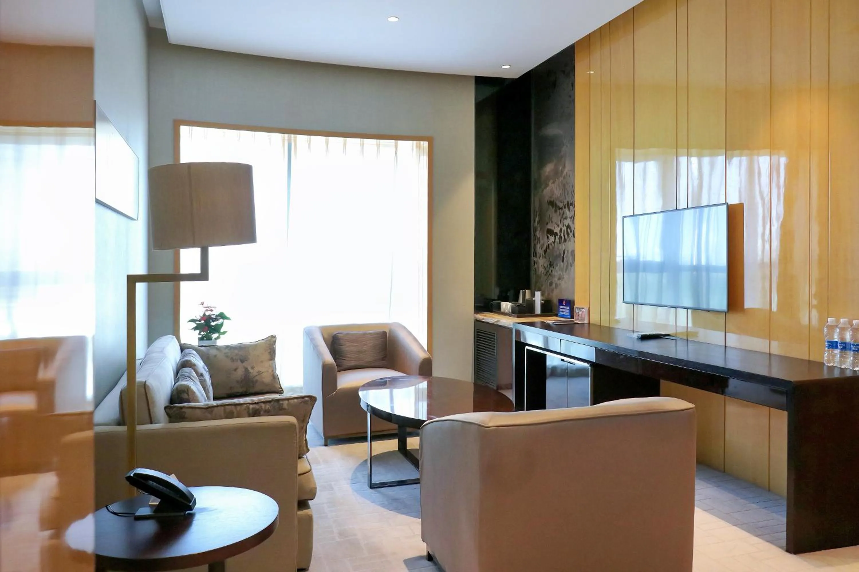 Living room in Crowne Plaza Beijing Lido by IHG