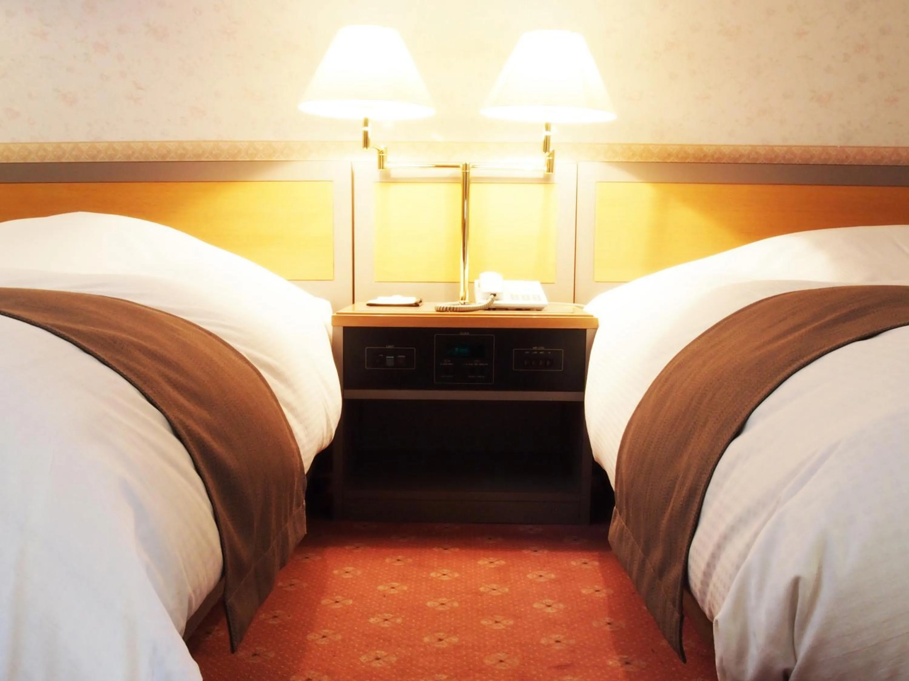 Bed in Takayama City Hotel Four Seasons