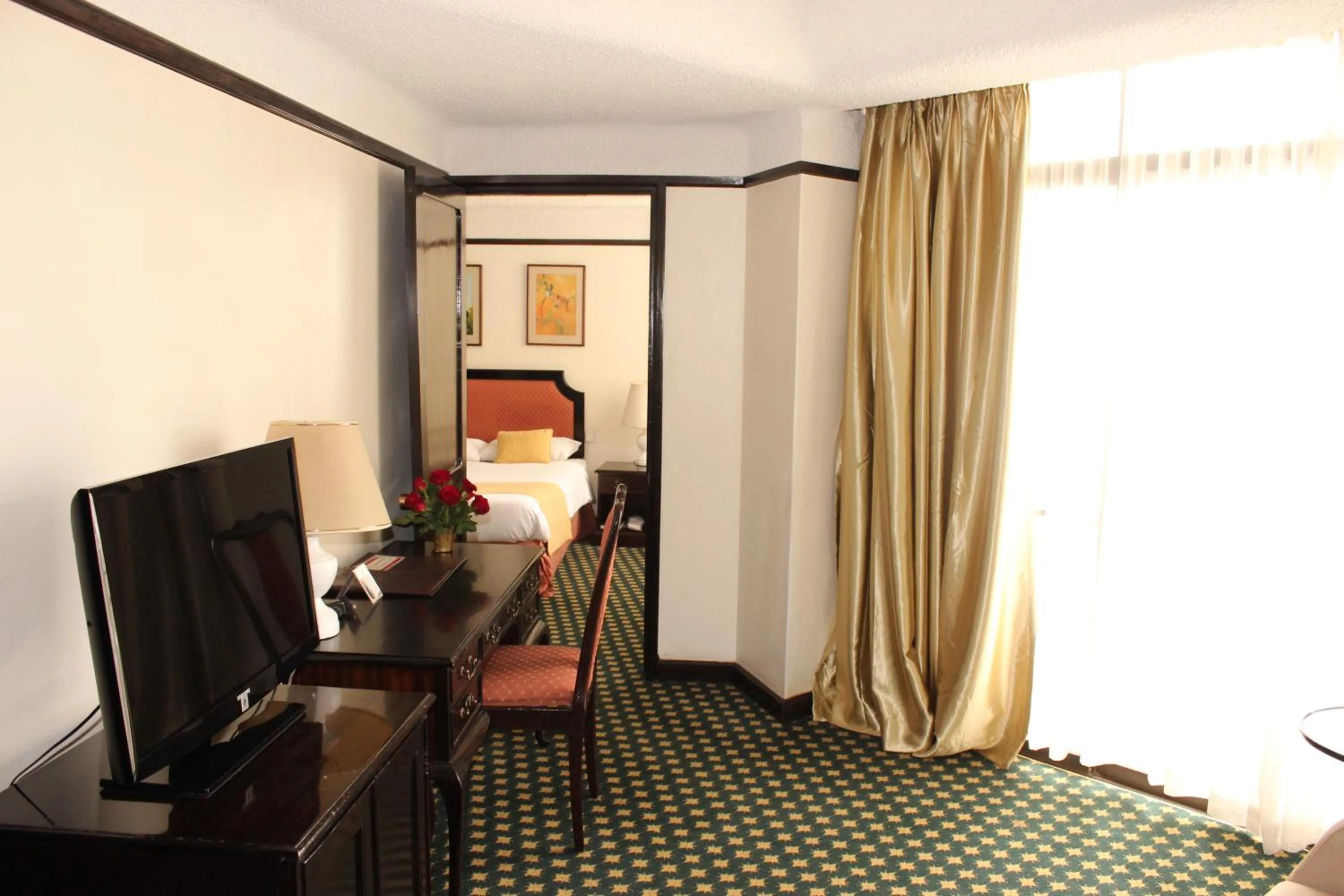 Living room in Nairobi Safari Club by Swiss-Belhotel