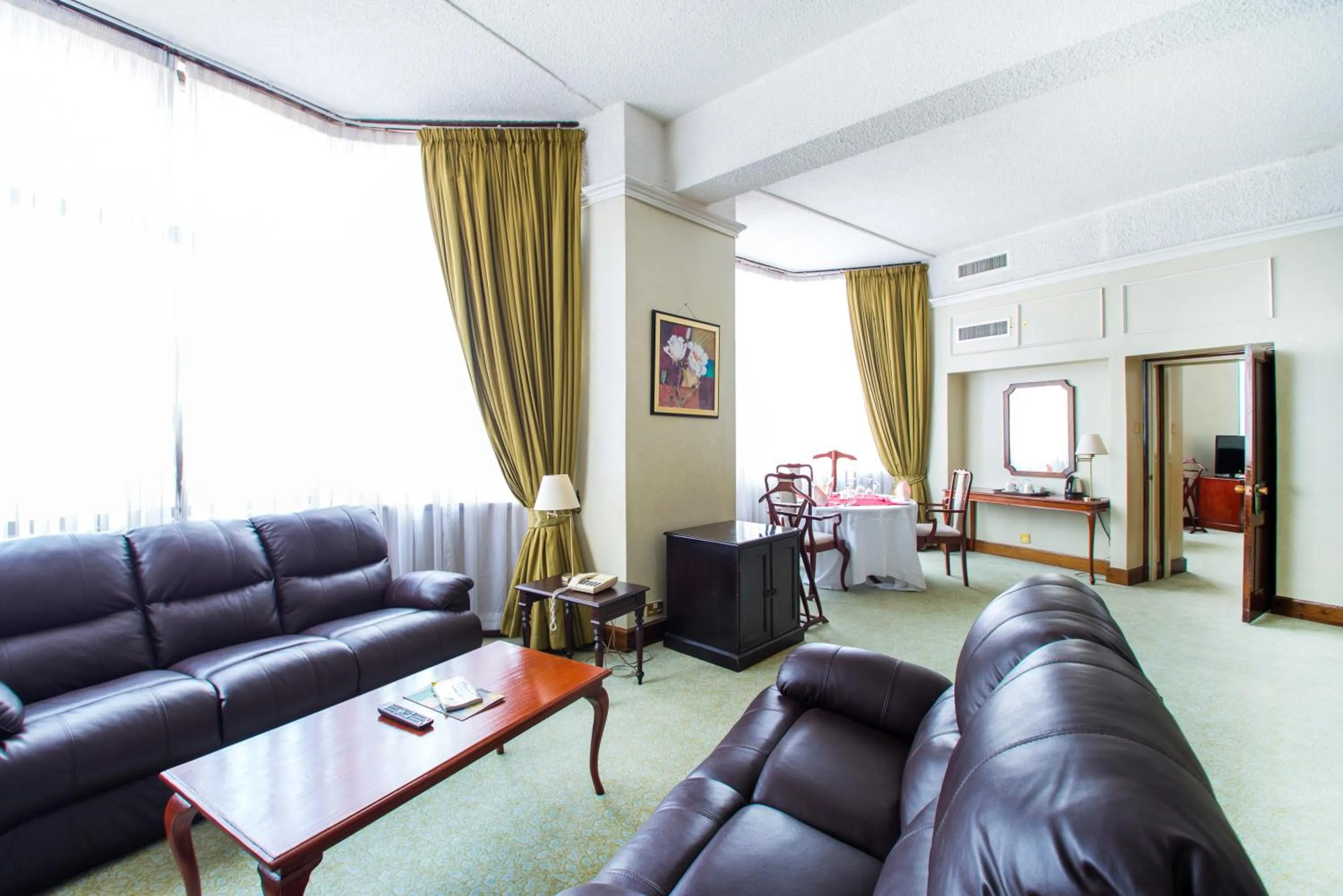 Living room in Nairobi Safari Club by Swiss-Belhotel