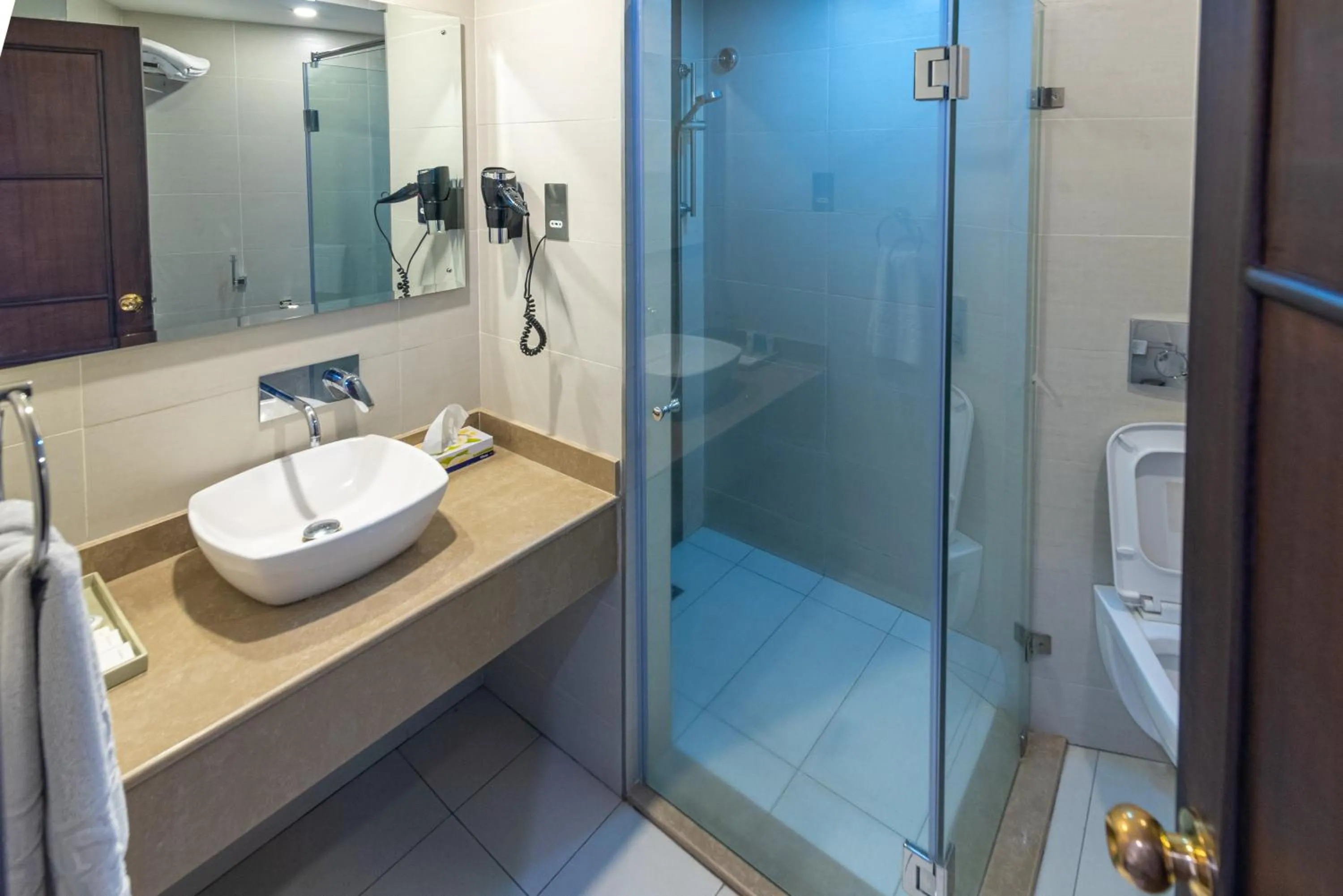 Bathroom in Nairobi Safari Club by Swiss-Belhotel