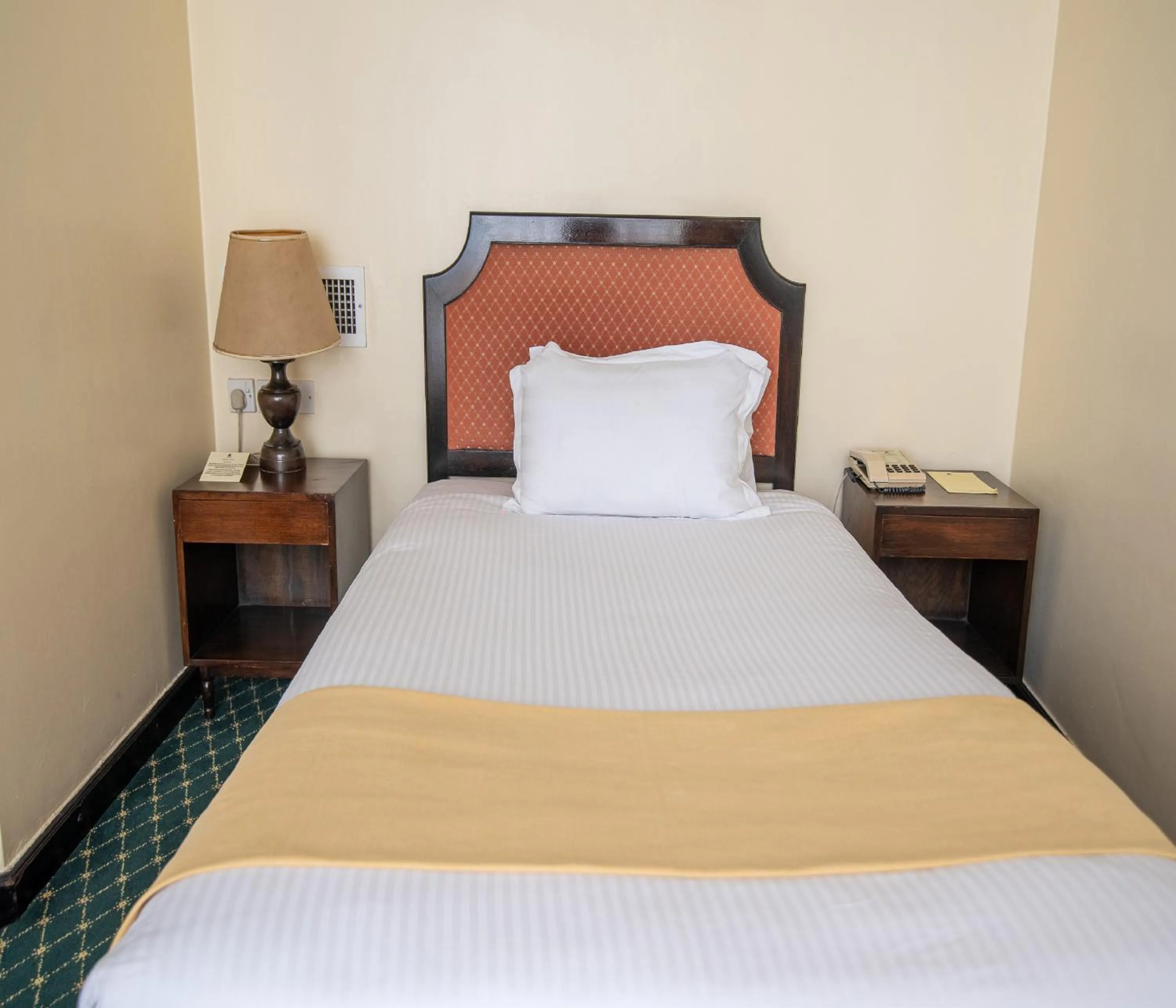Bed in Nairobi Safari Club by Swiss-Belhotel