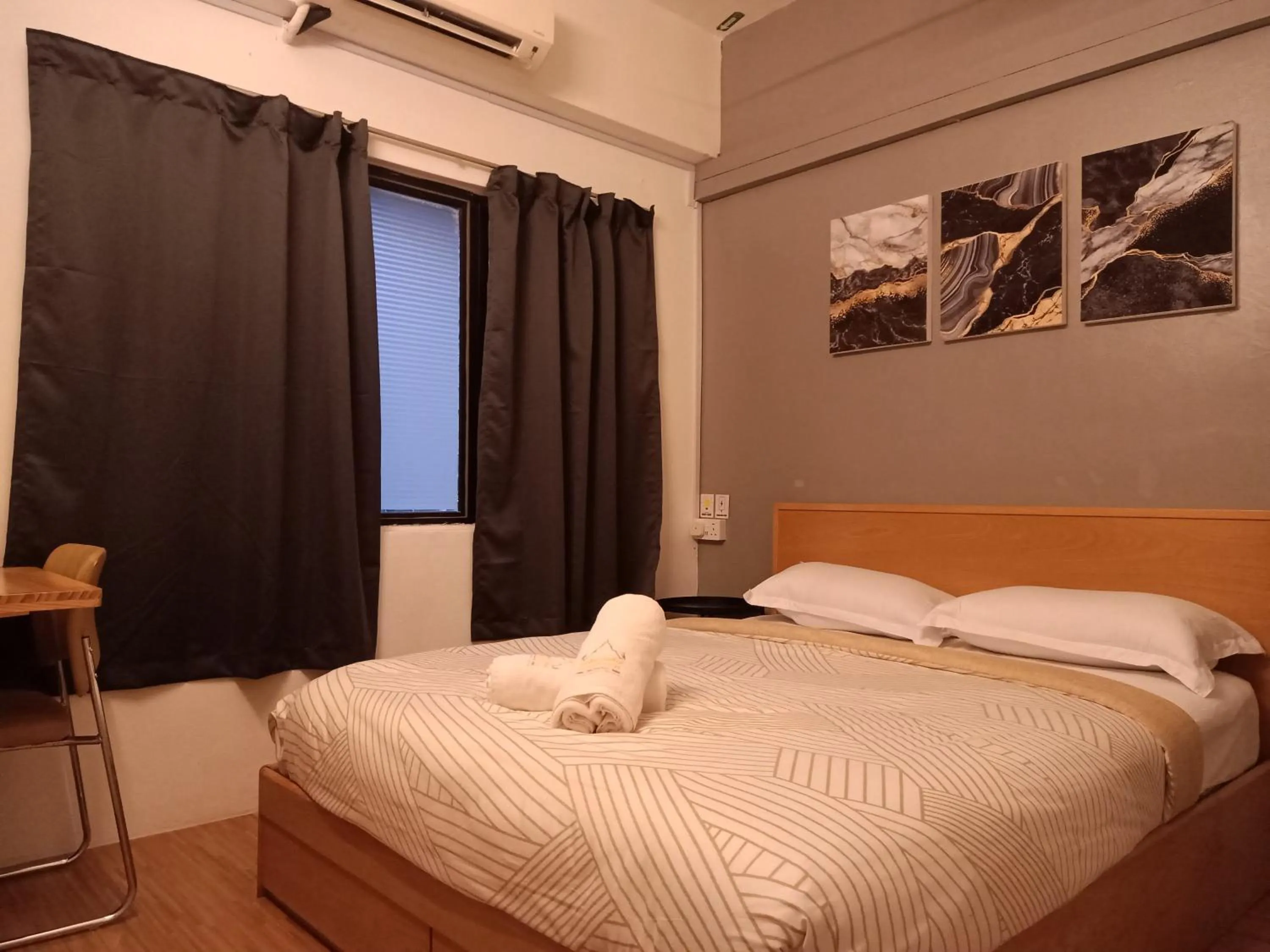 Photo of the whole room, Bed in Sabai Sabai Guesthouse in Bayan Lepas