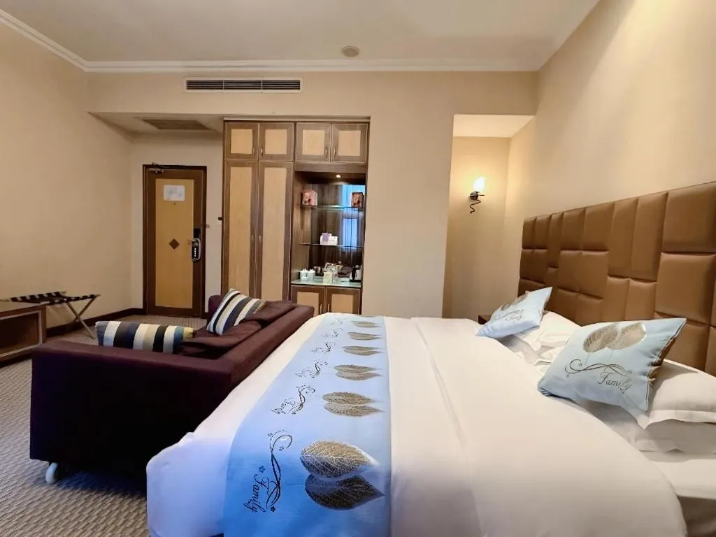 Bed in Chongqing Milky Way Hotel