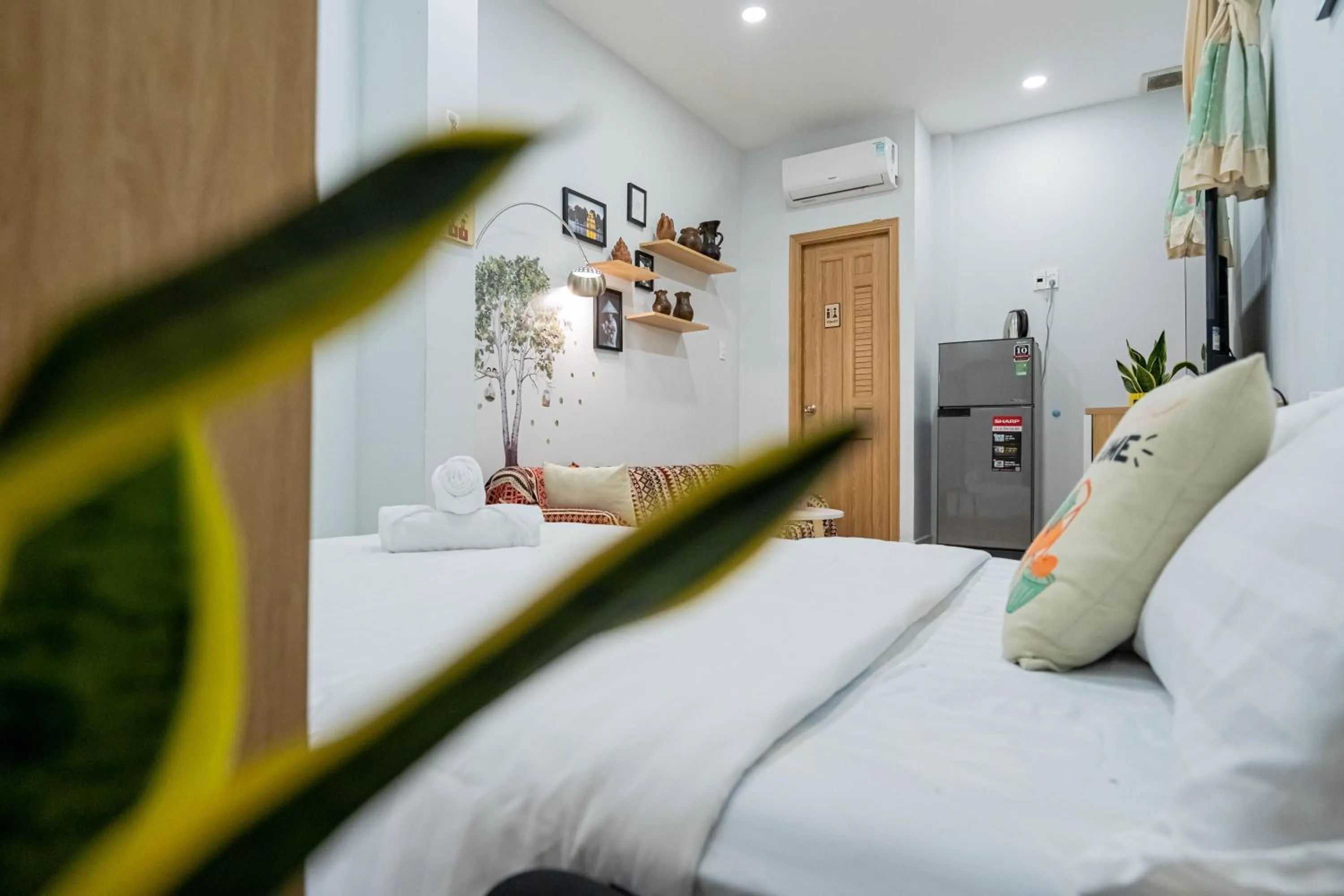 Photo of the whole room in LalaHouse Spring Apartment - Saigon Center