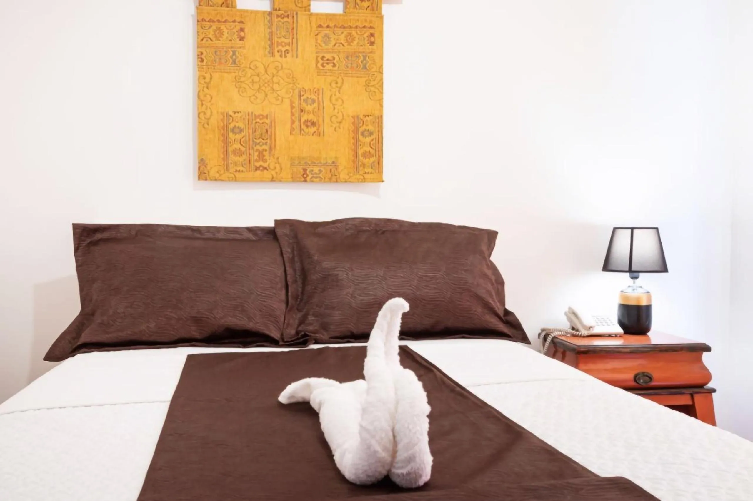 Bed in HOSTAL DEL RÍO