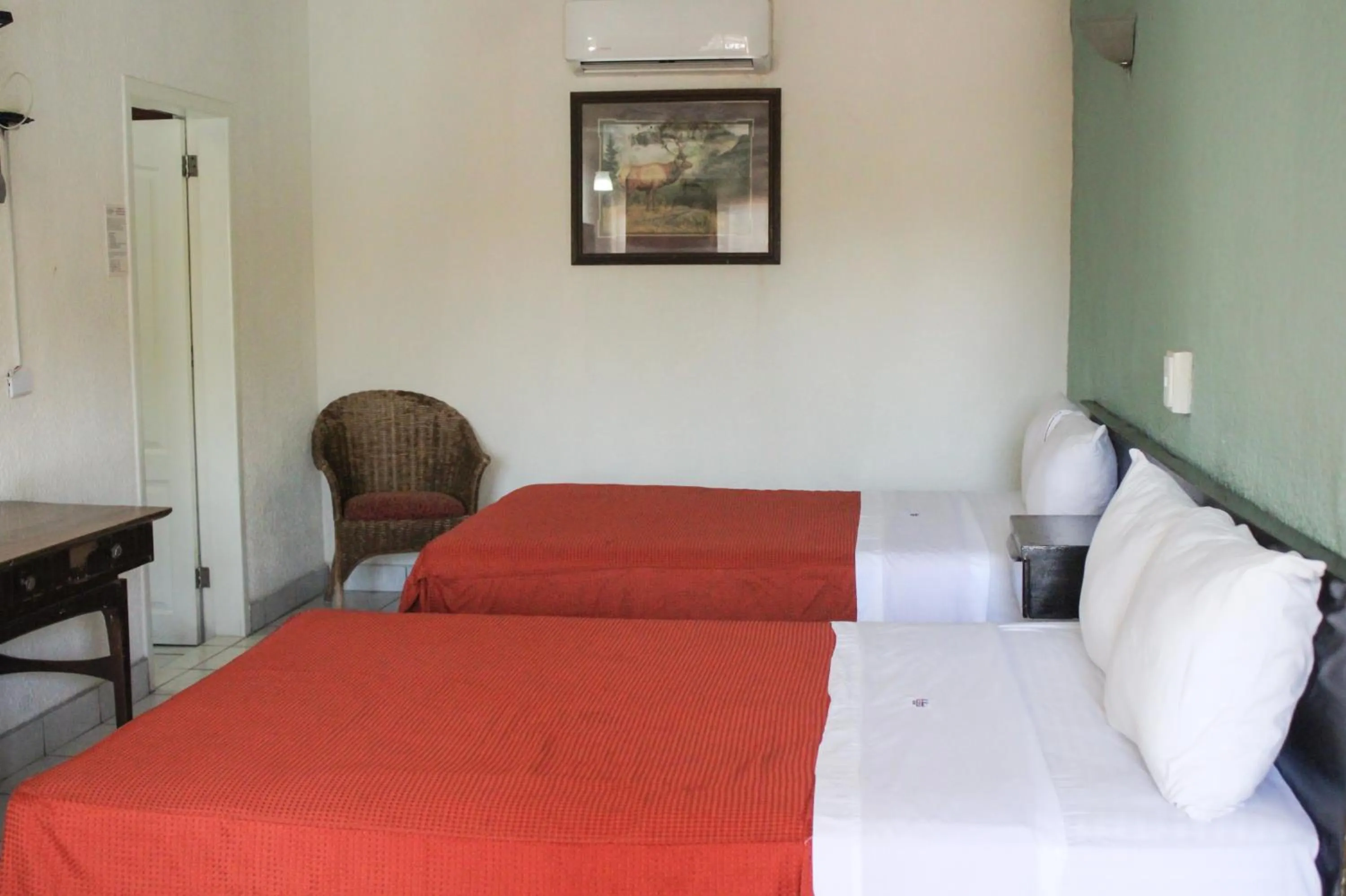 Bed in Hotel La Quinta Posada Real