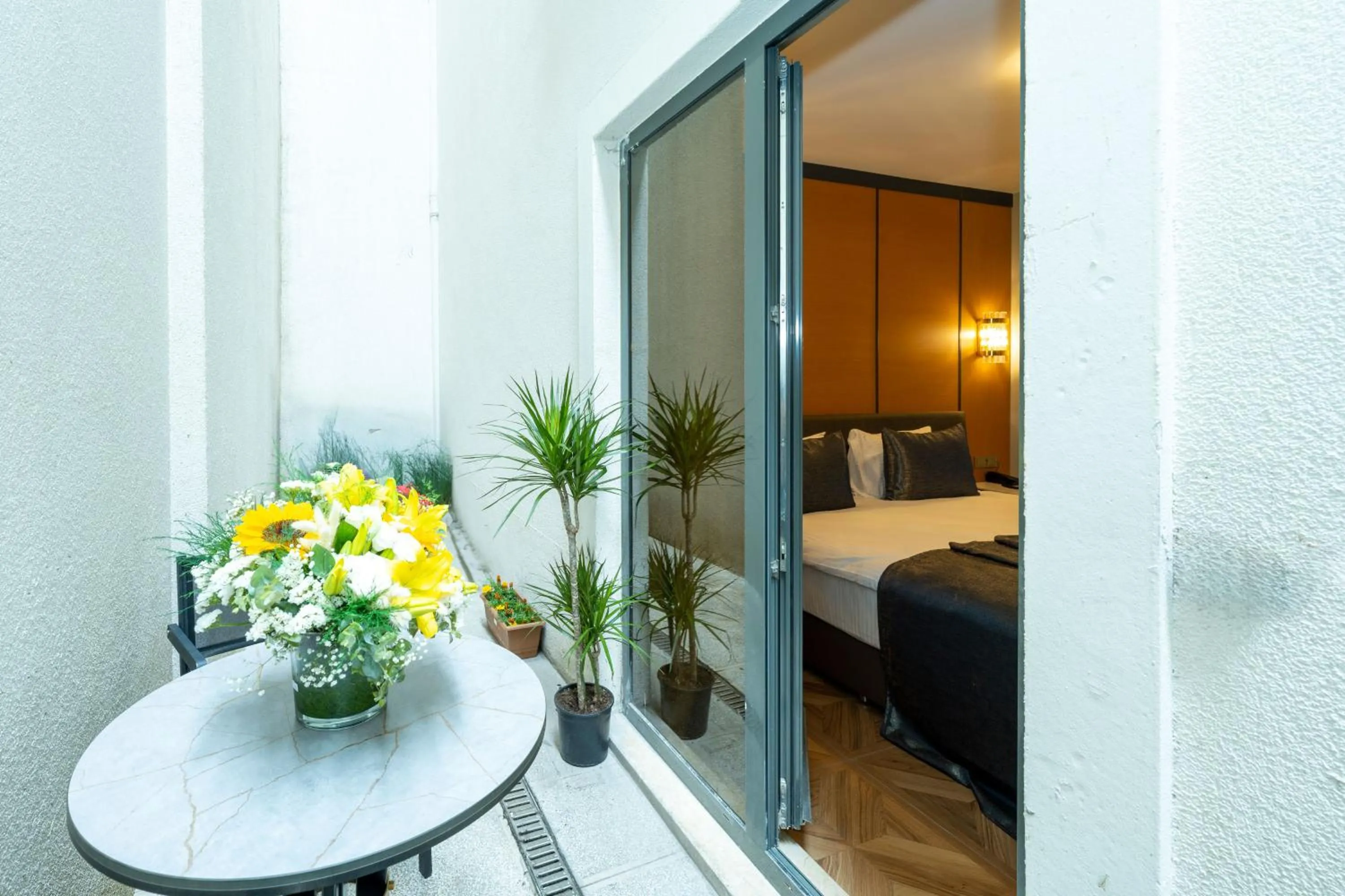 Balcony/Terrace, Bed in Freya Hotel