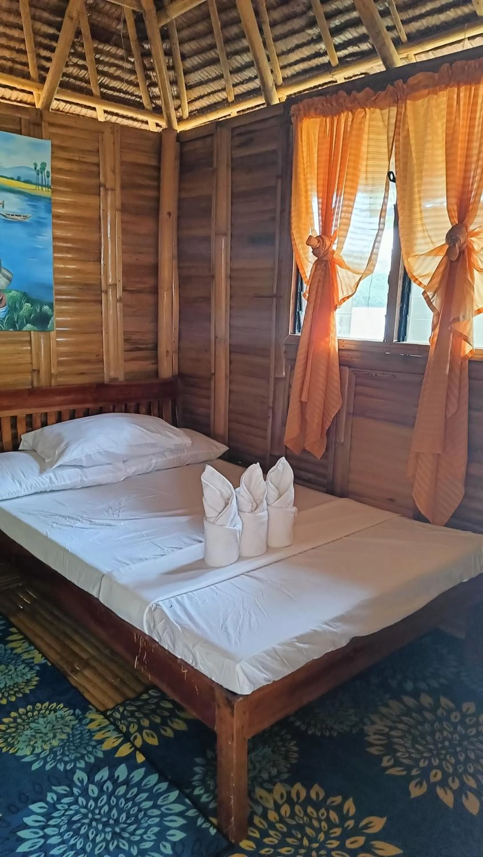 Bed in NATUA'S BEACH RESORT