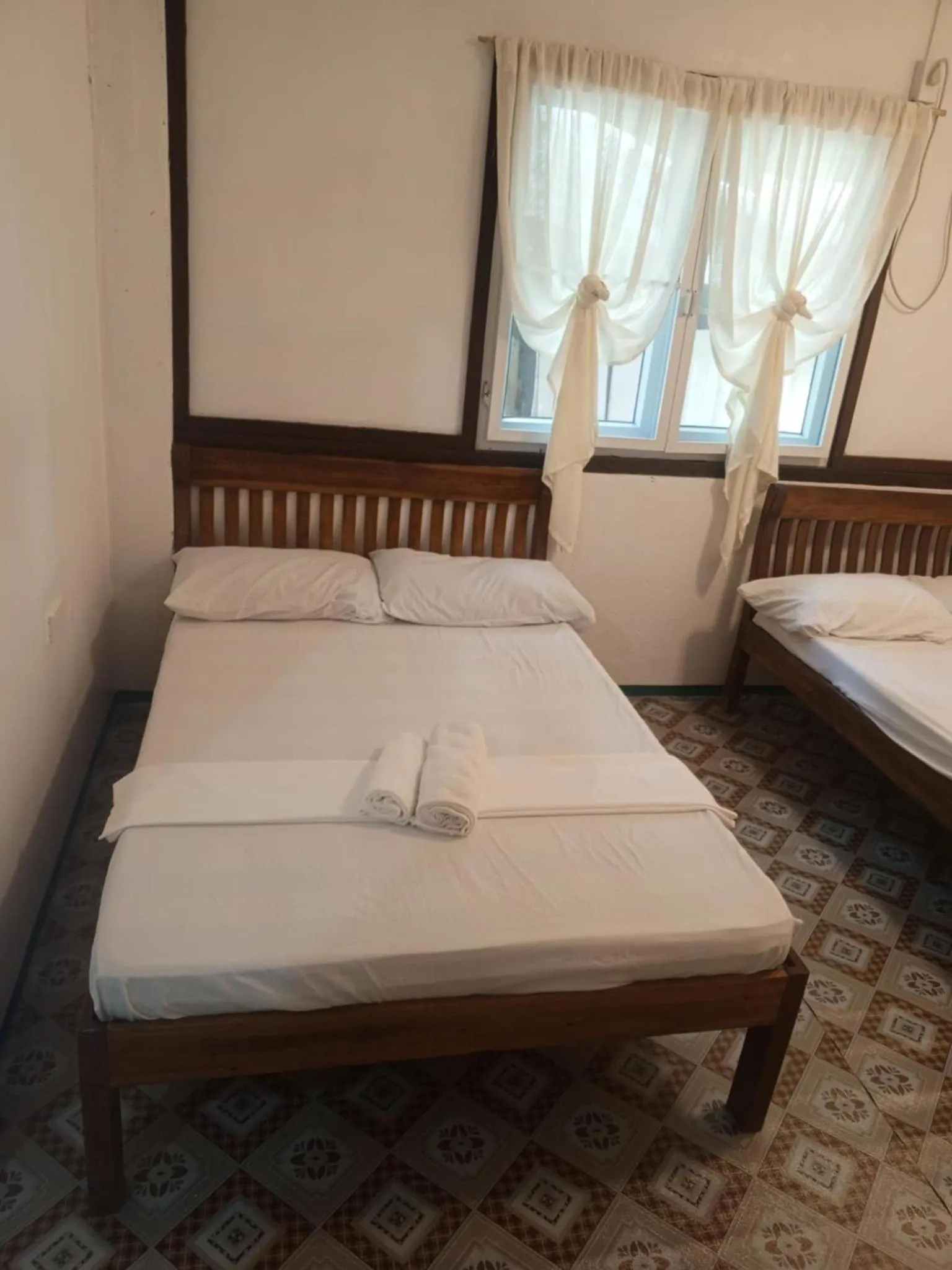 Bed in NATUA'S BEACH RESORT