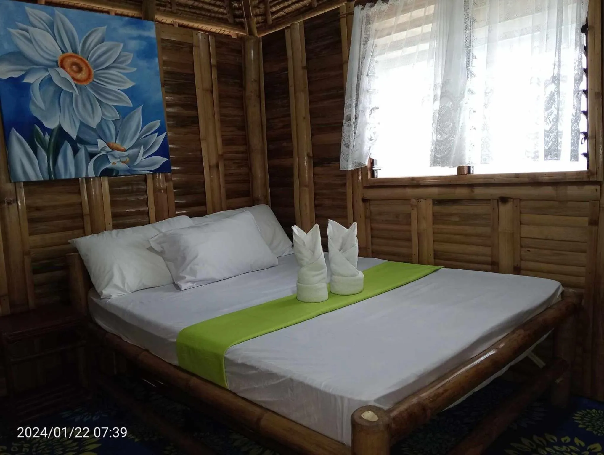 Bed in NATUA'S BEACH RESORT
