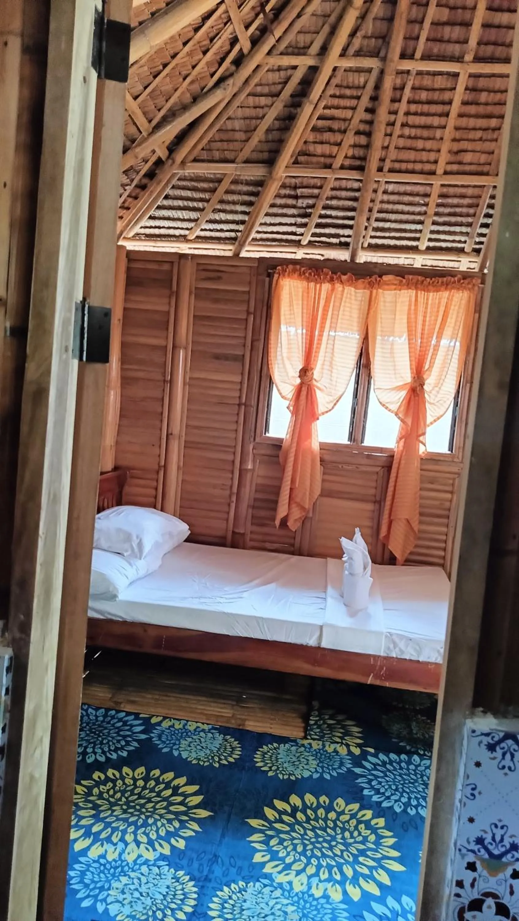 Bed in NATUA'S BEACH RESORT