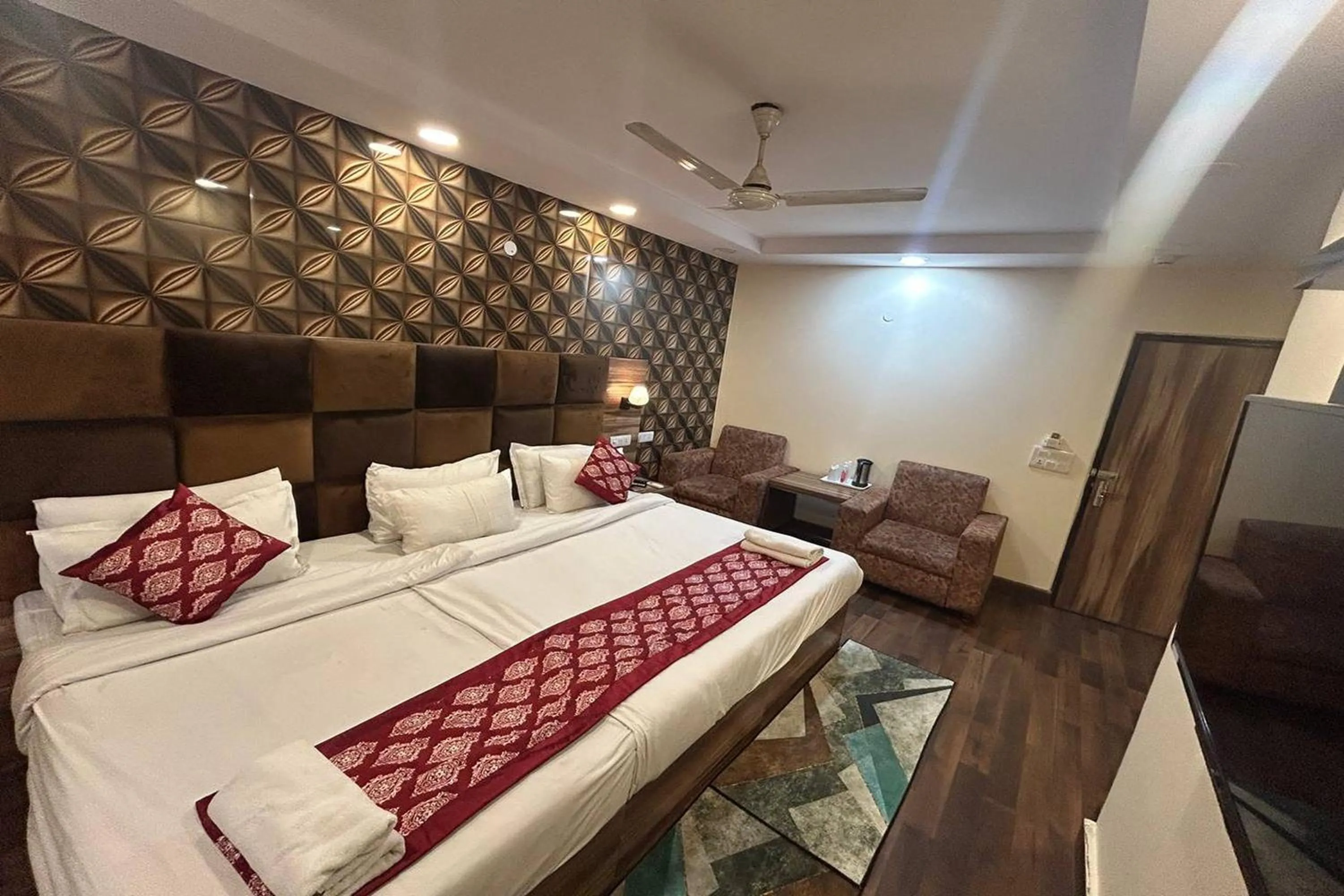 Bed in HOTEL SINGH CONTINETAL