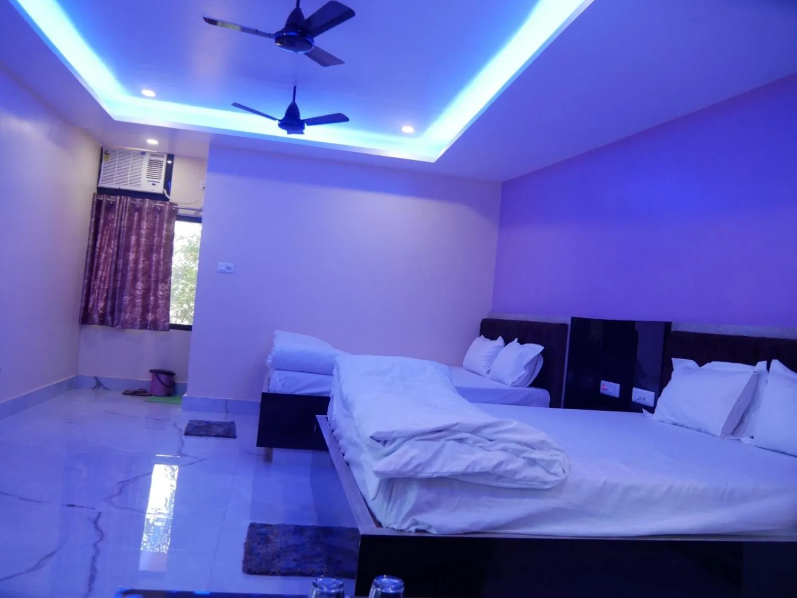 Bed in Vaidehi Inn-A Unit of vaidehi guest house