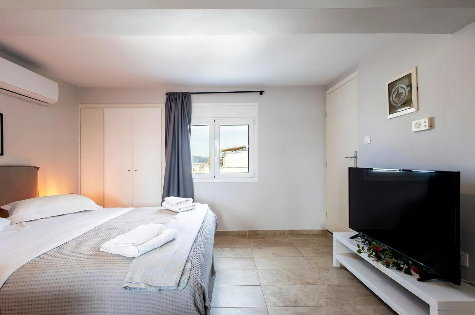 TV and multimedia in Aris123 by Smart Cozy Suites - Apartments in the heart of Athens - 5 minutes from metro - Available 24hr