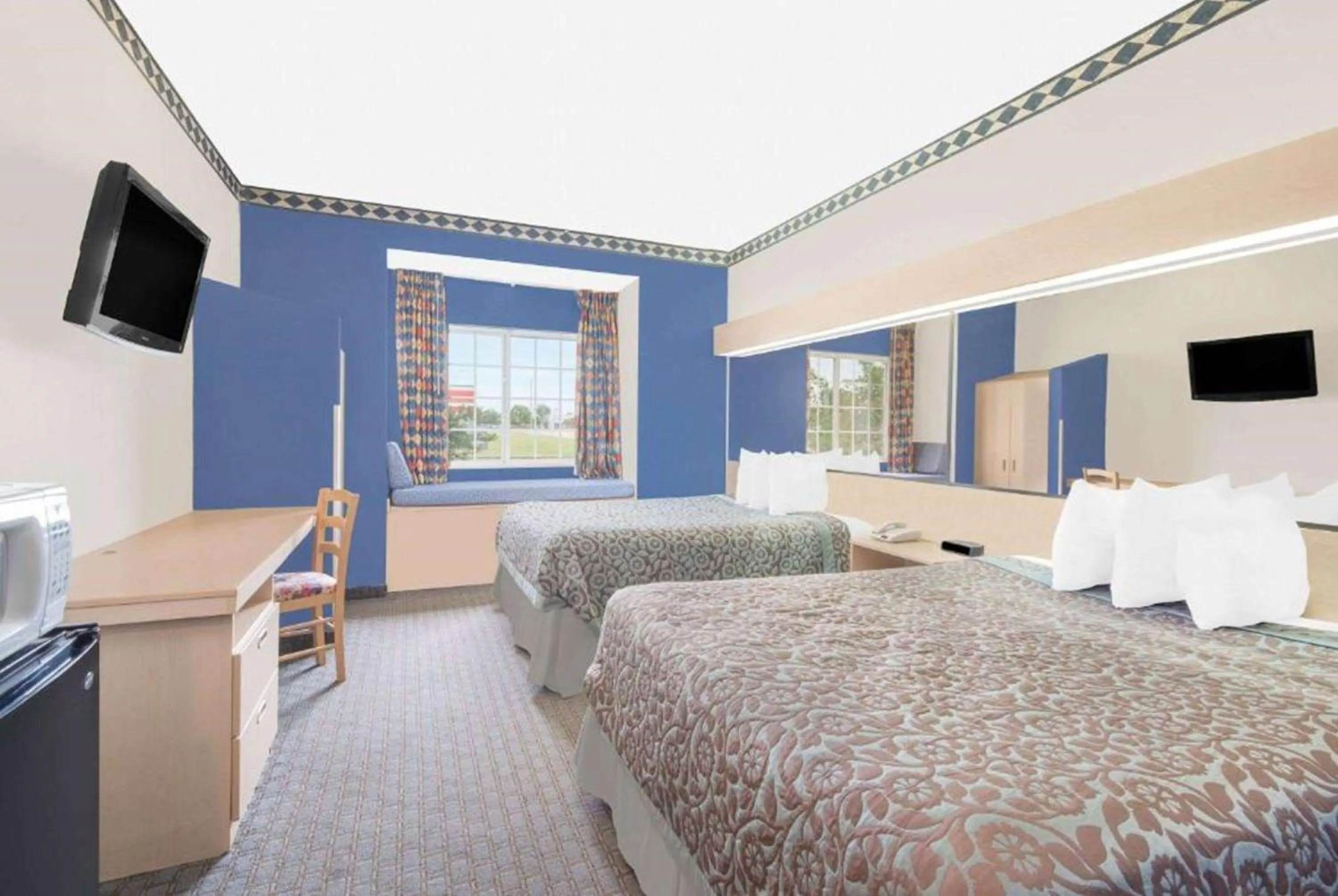 Photo of the whole room, Bed in Days Inn & Suites by Wyndham Hutchinson