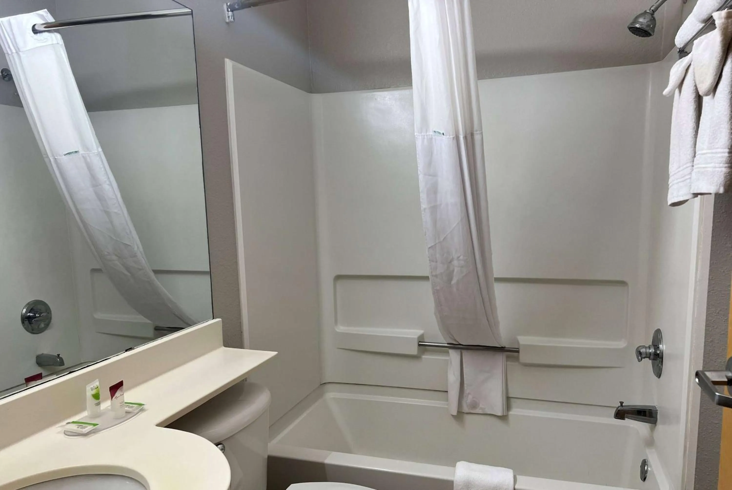 Bathroom in Days Inn & Suites by Wyndham Hutchinson