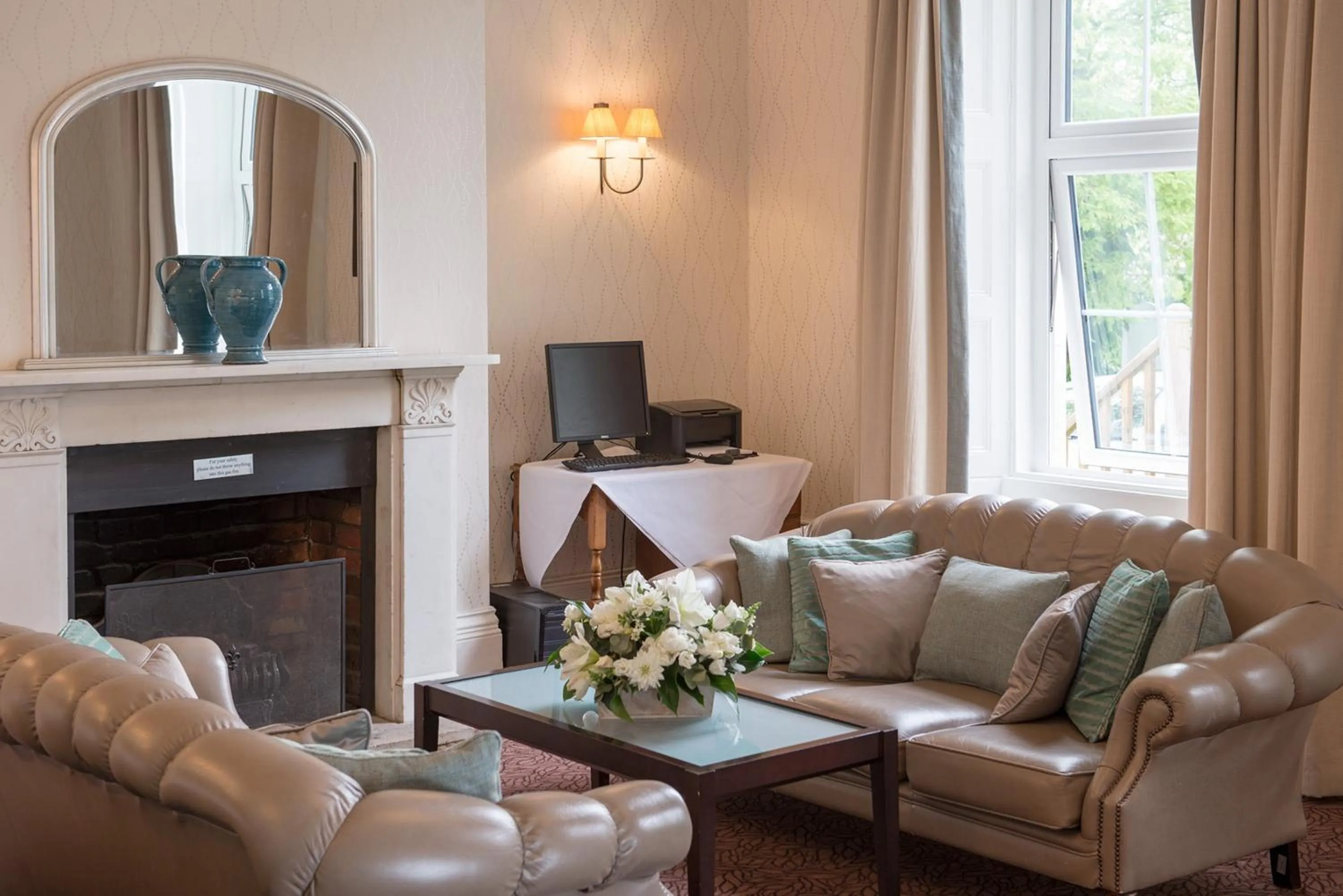 Communal lounge/ TV room in Forest Lodge Hotel