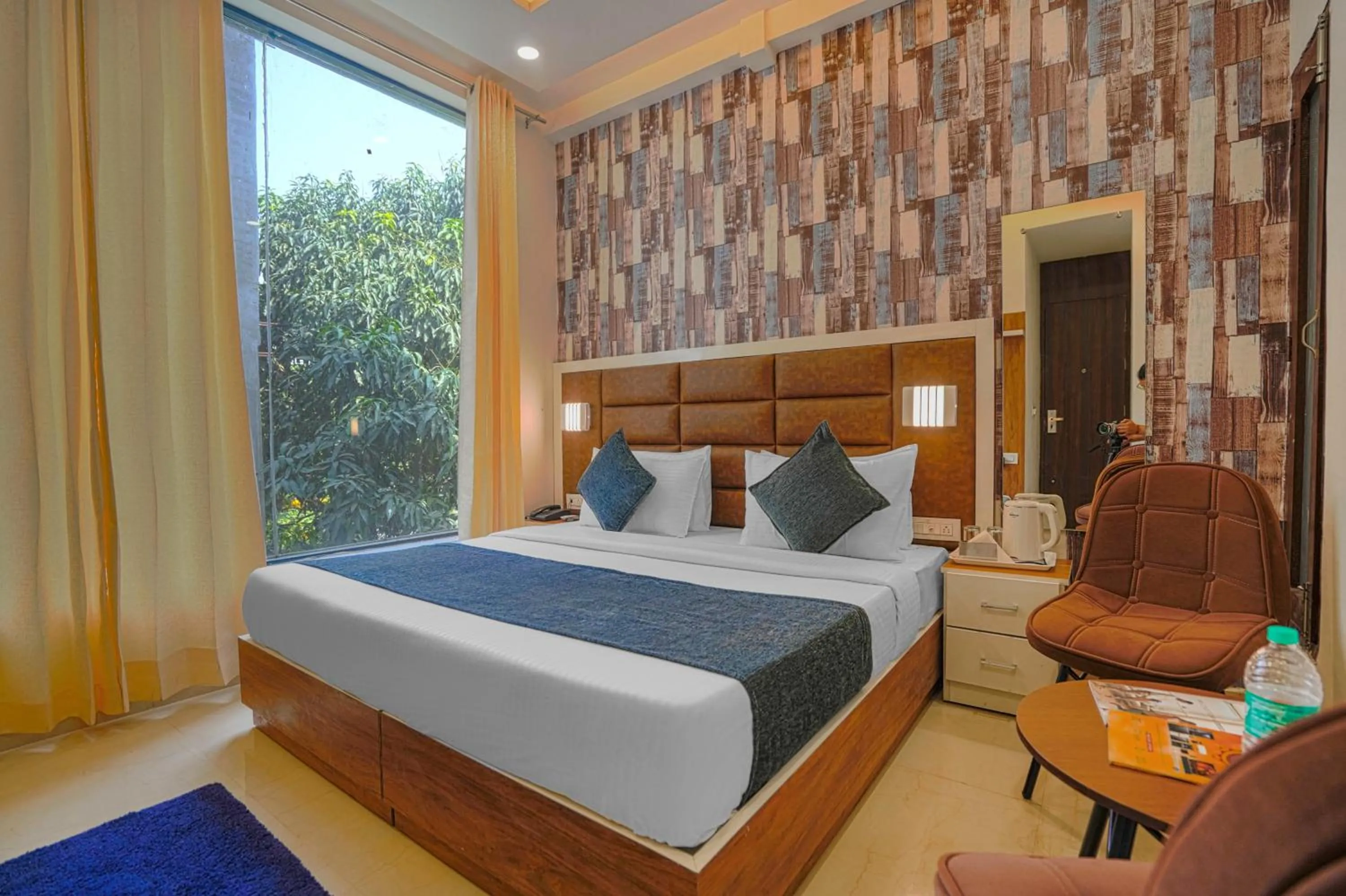 Photo of the whole room, Bed in Hotel Paras Chandigarh Zirakpur