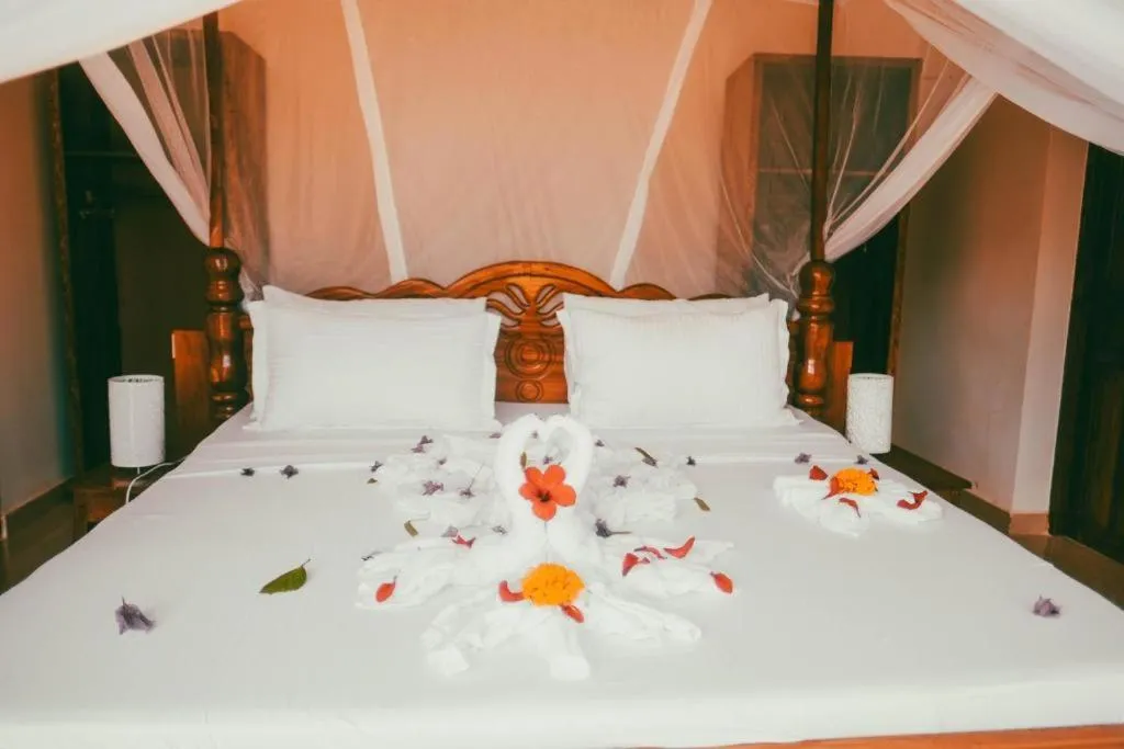 Bed in The Villa of Zanzibar