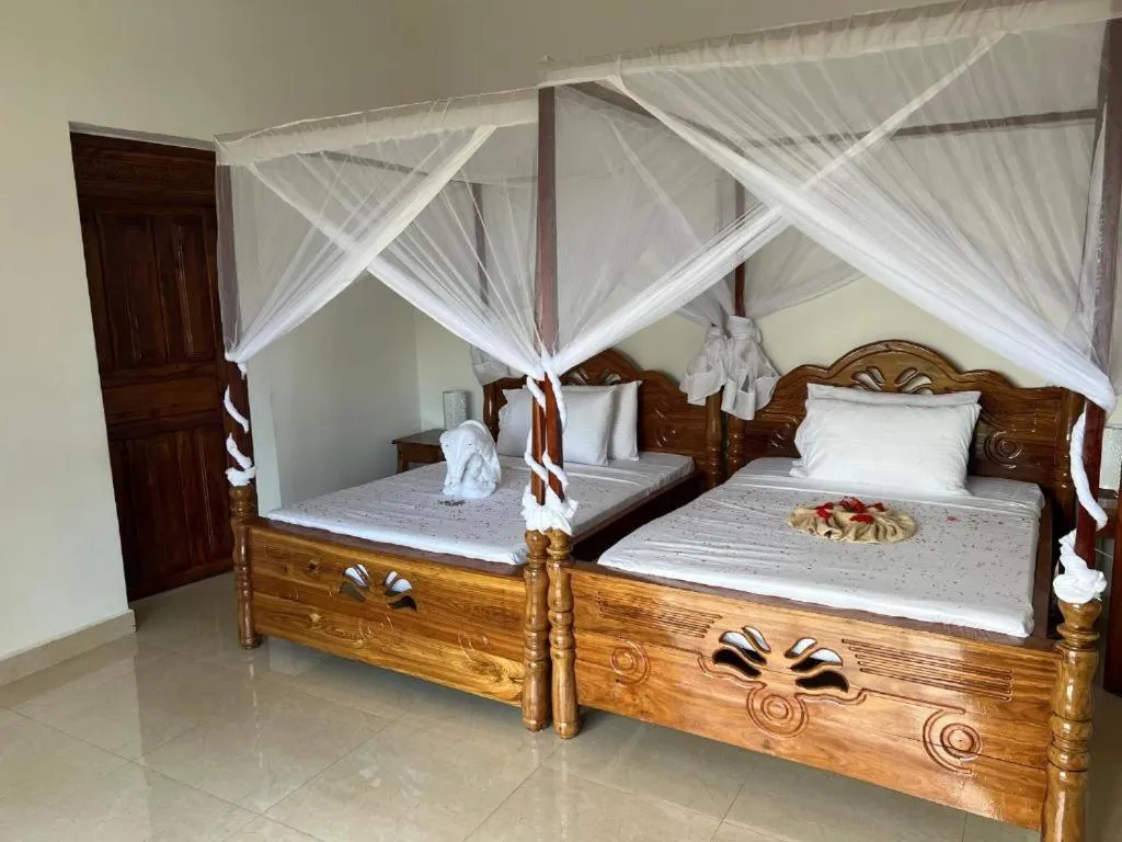 Bed in The Villa of Zanzibar