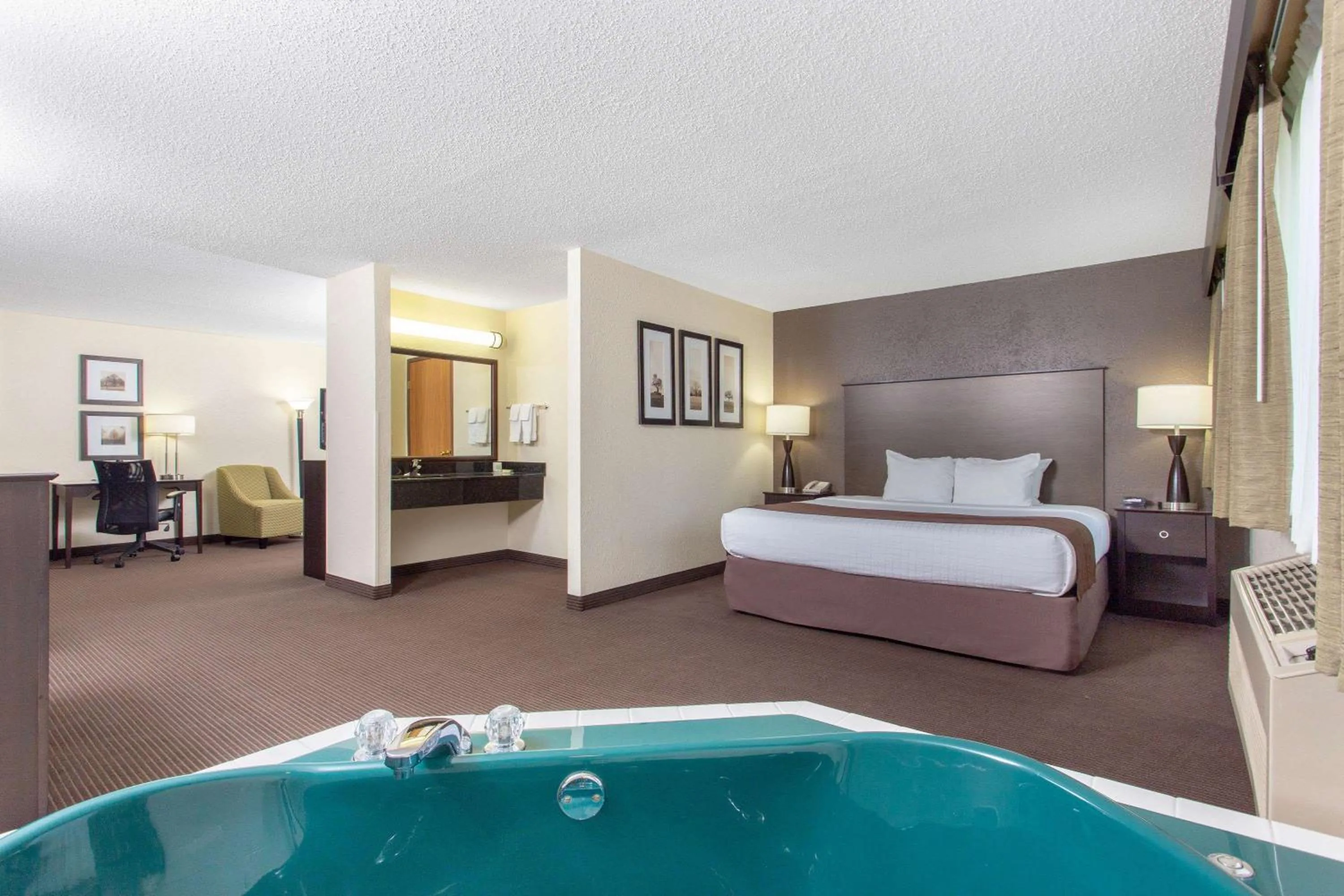 Photo of the whole room, Bed in AmericInn by Wyndham Rhinelander