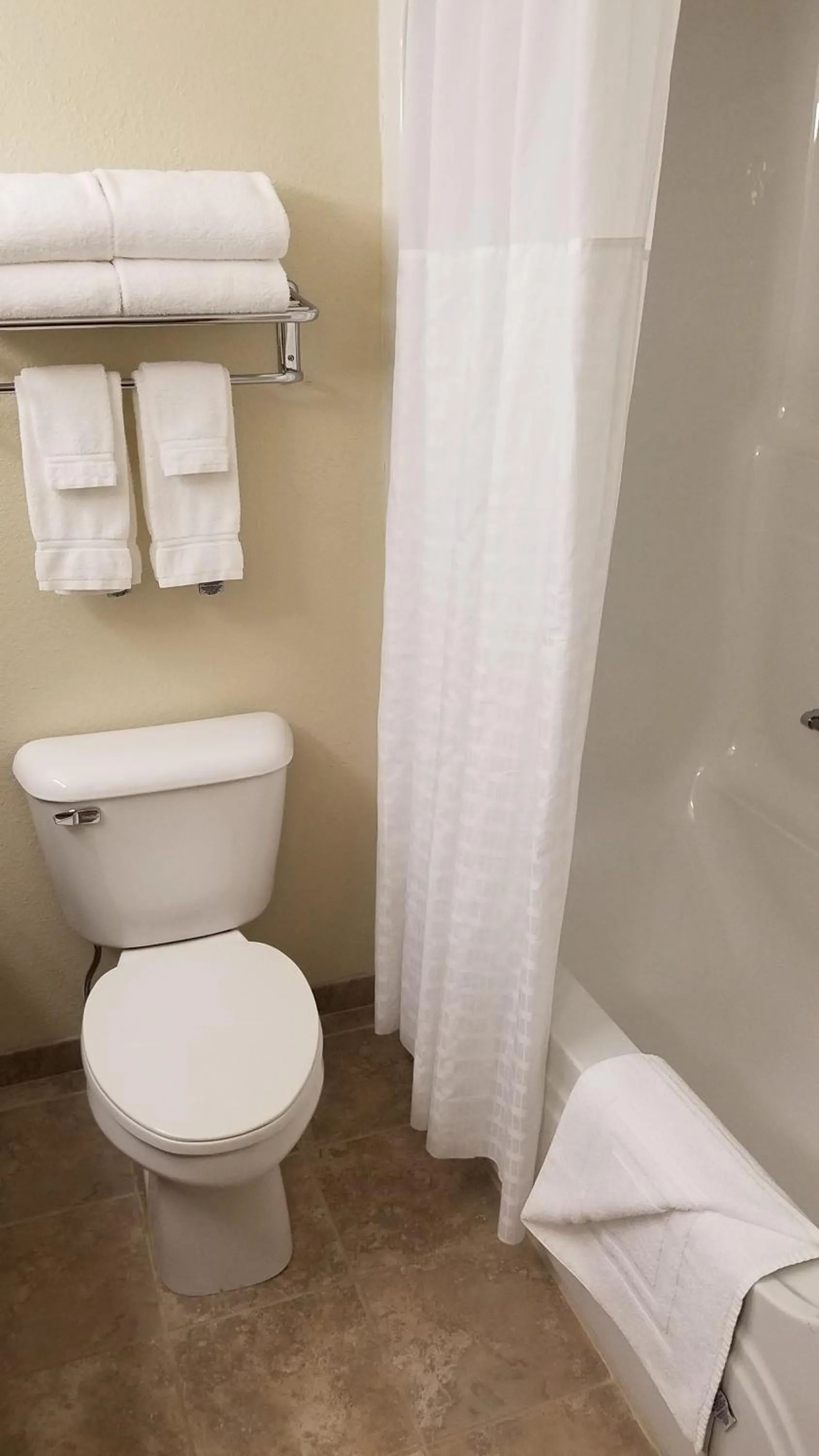 Toilet in AmericInn by Wyndham Rhinelander