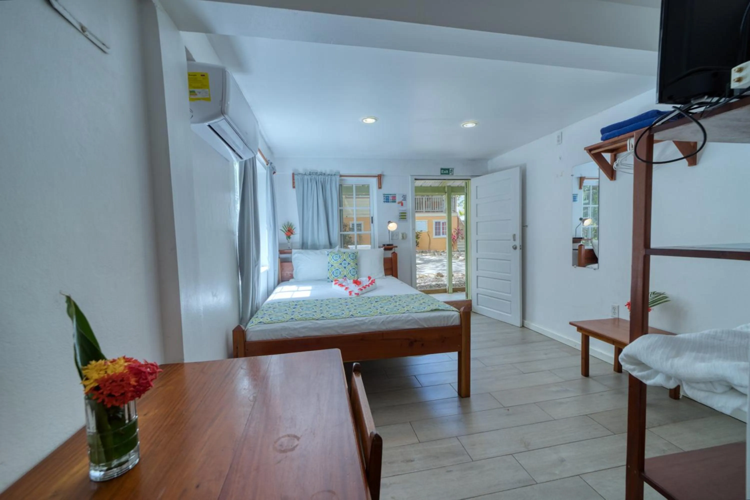 Photo of the whole room, Bed in Placencia Villas