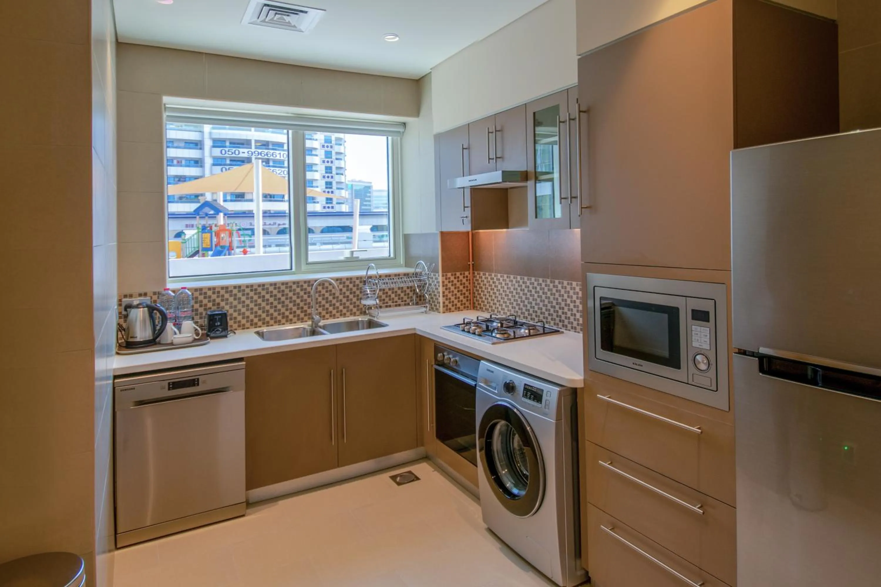 Kitchen or kitchenette in Jood Hotel Apartments