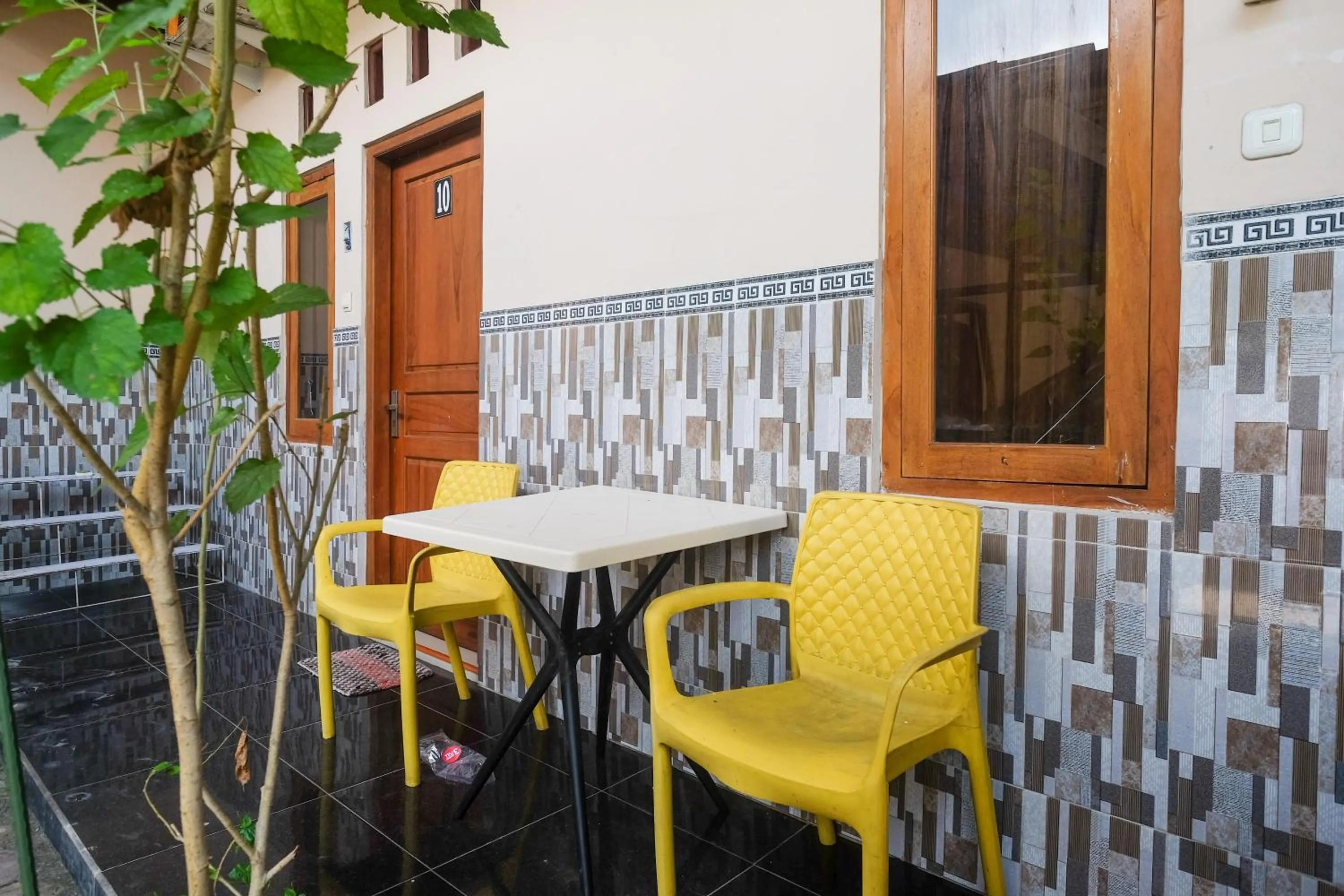 Seating area in RedDoorz Syariah near Exit Toll Palur