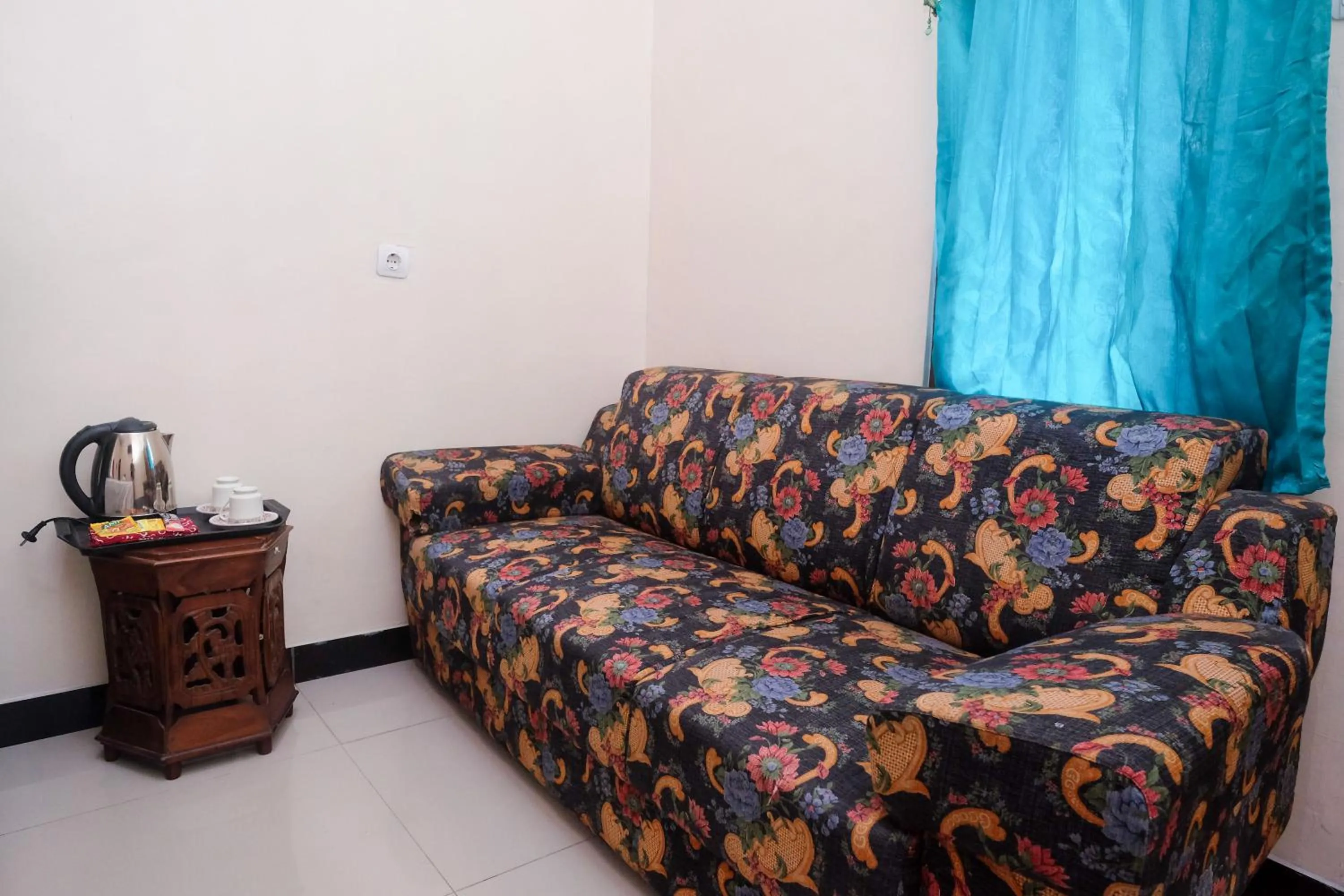 Seating area in RedDoorz Syariah near Exit Toll Palur