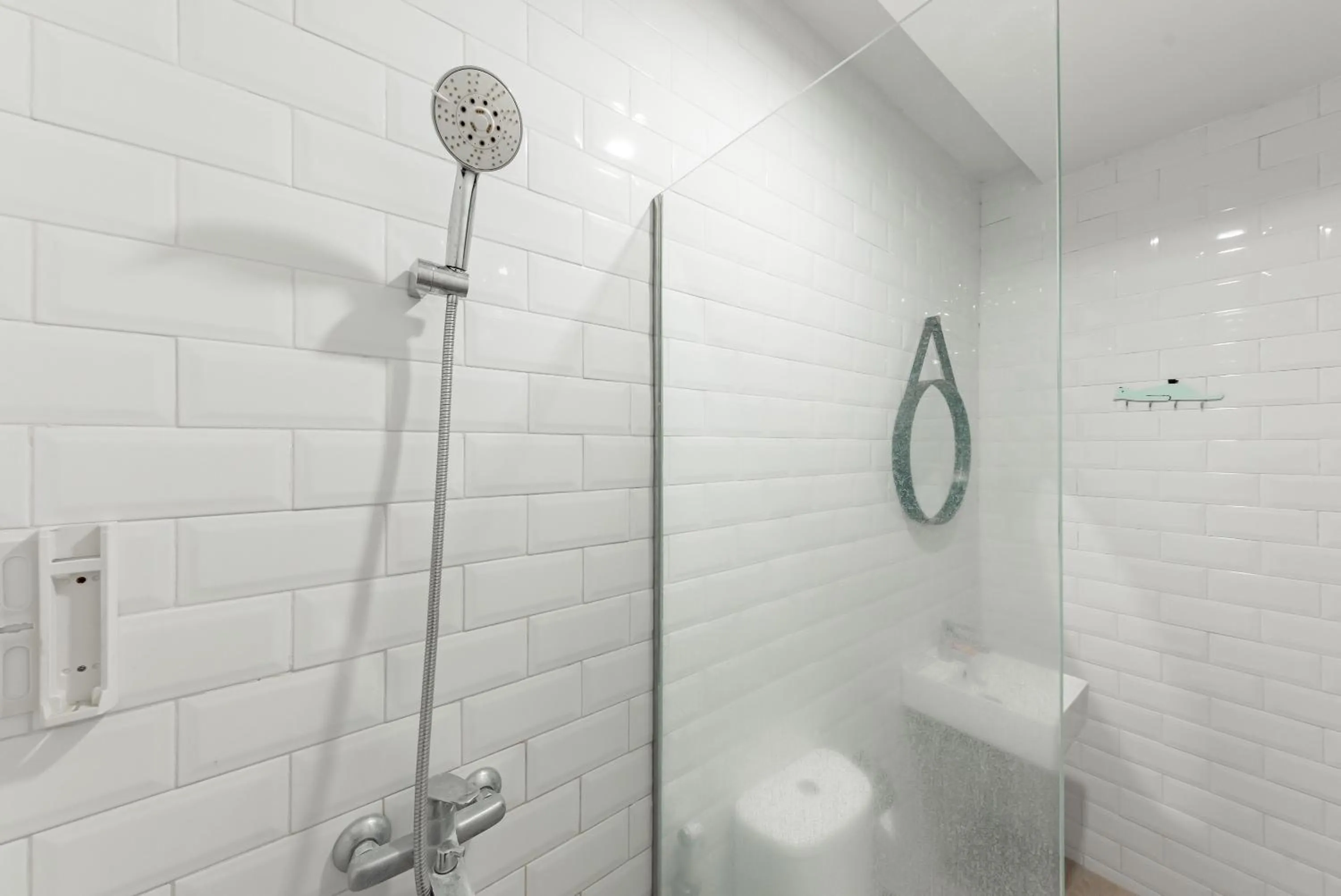 Bathroom in Sans Hotel Bobosini Malang by RedDoorz