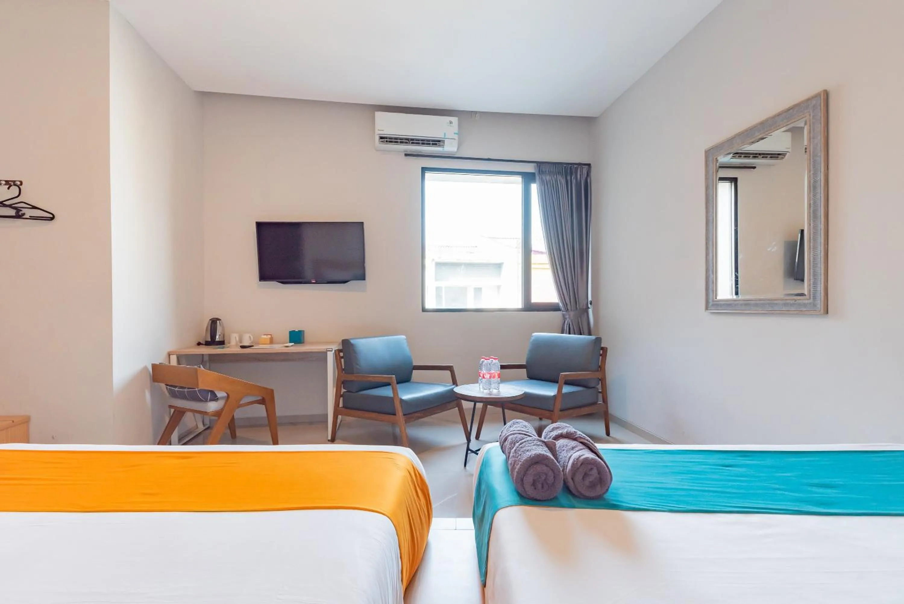 Bedroom in Sans Hotel Bobosini Malang by RedDoorz