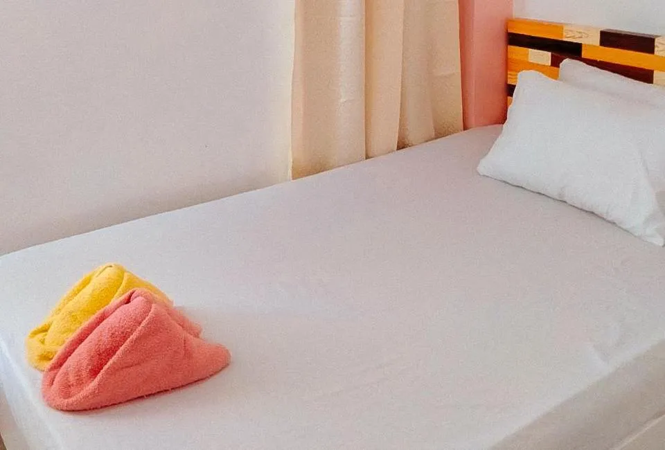 Shower, Bed in RedDoorz @ Jmalls Island Tourist Inn Dinagat Island