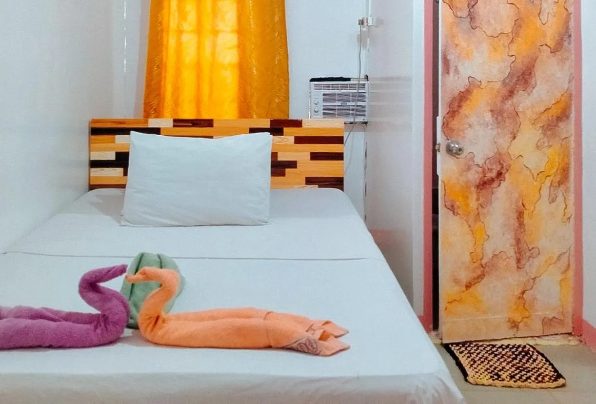 Bed in RedDoorz @ Jmalls Island Tourist Inn Dinagat Island
