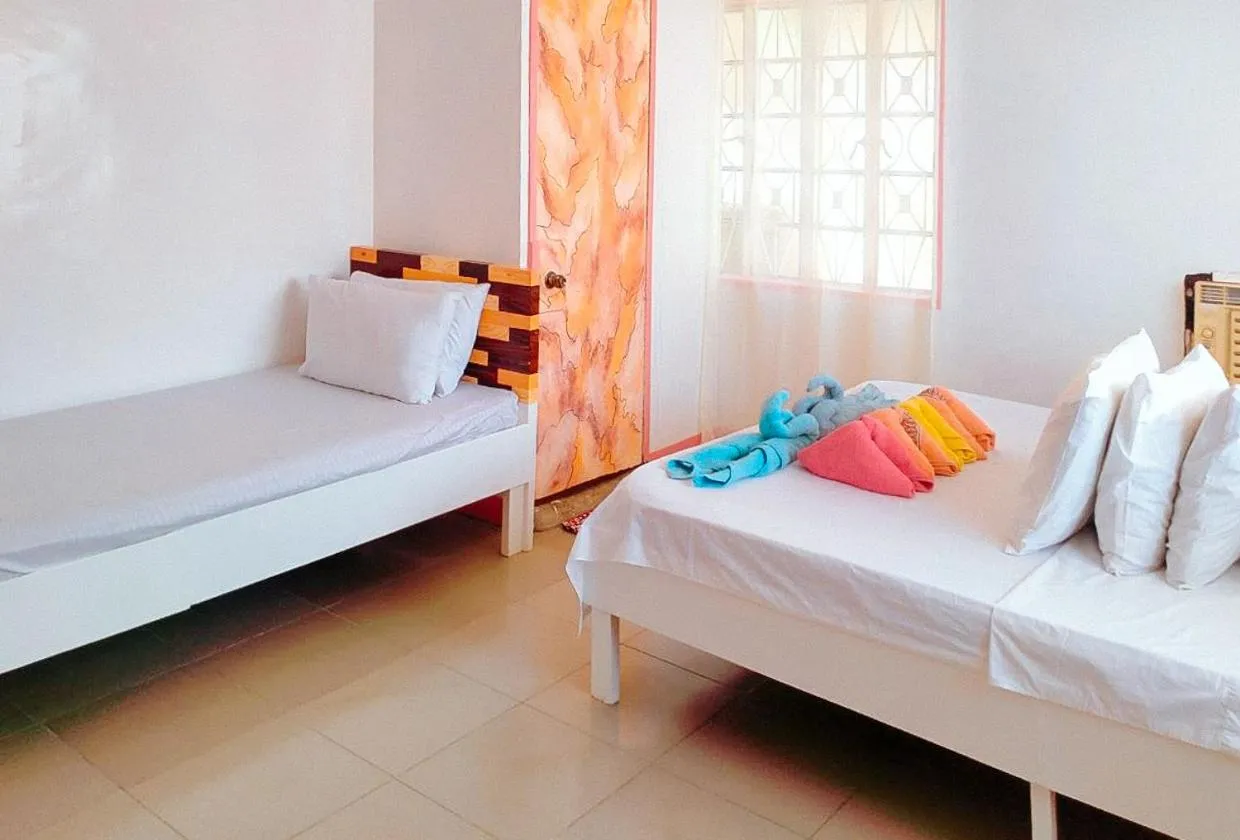 Shower, Bed in RedDoorz @ Jmalls Island Tourist Inn Dinagat Island