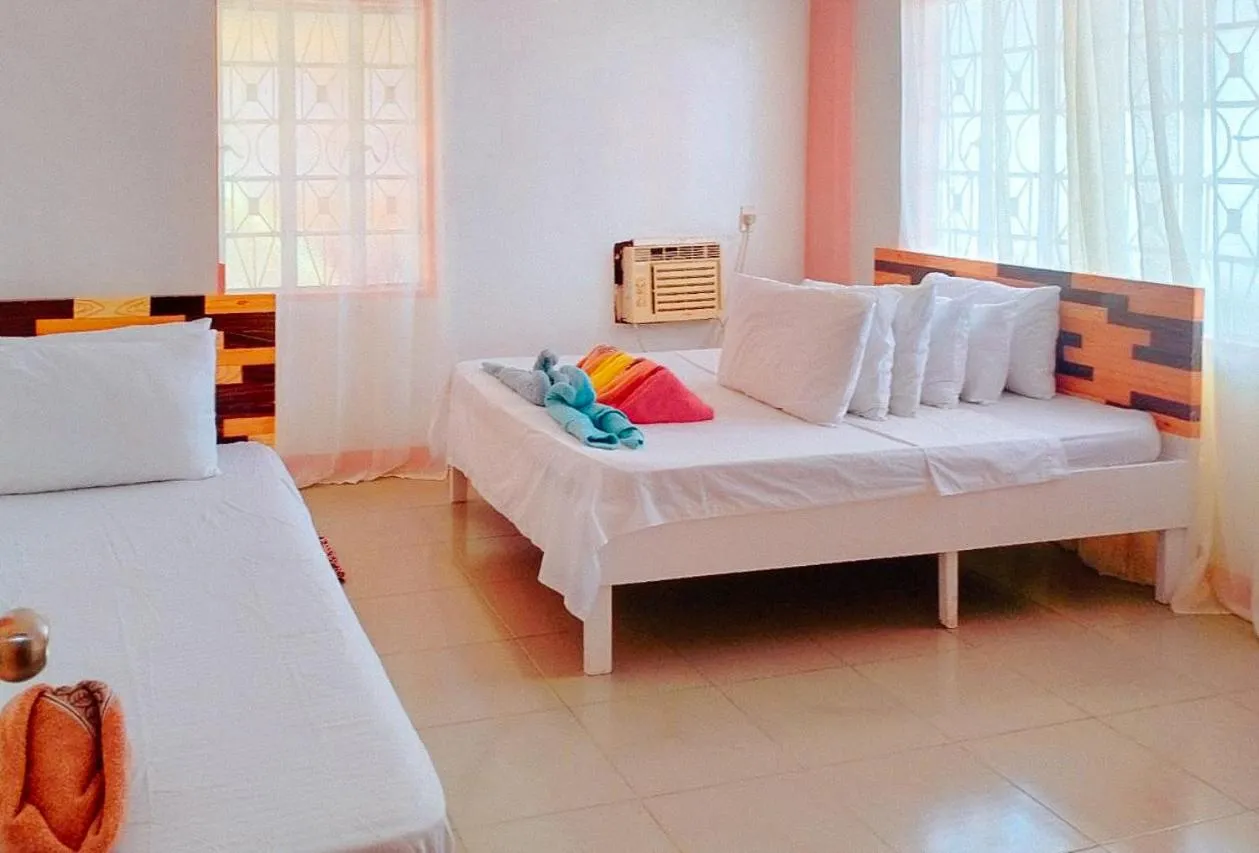 Bed in RedDoorz @ Jmalls Island Tourist Inn Dinagat Island