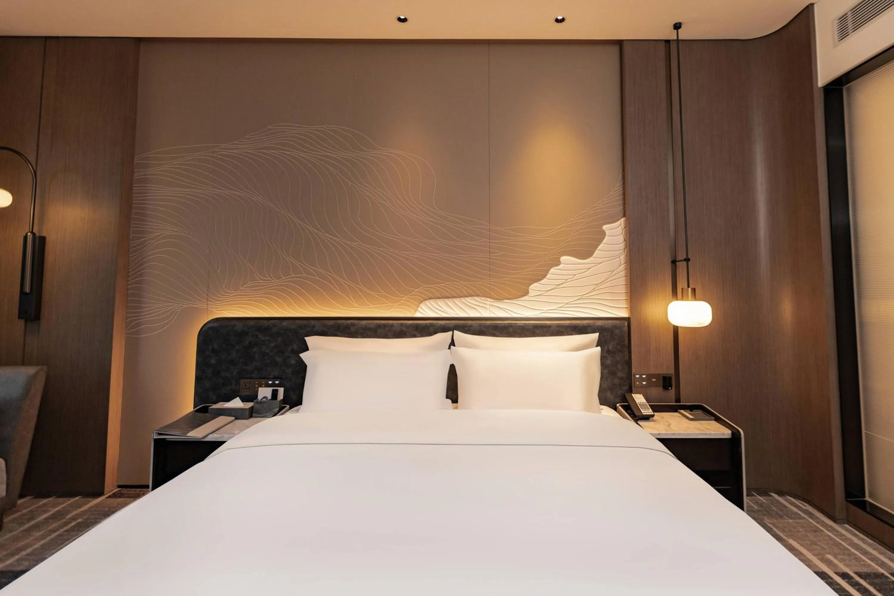 Bed in Wyndham Garden Gaozhou