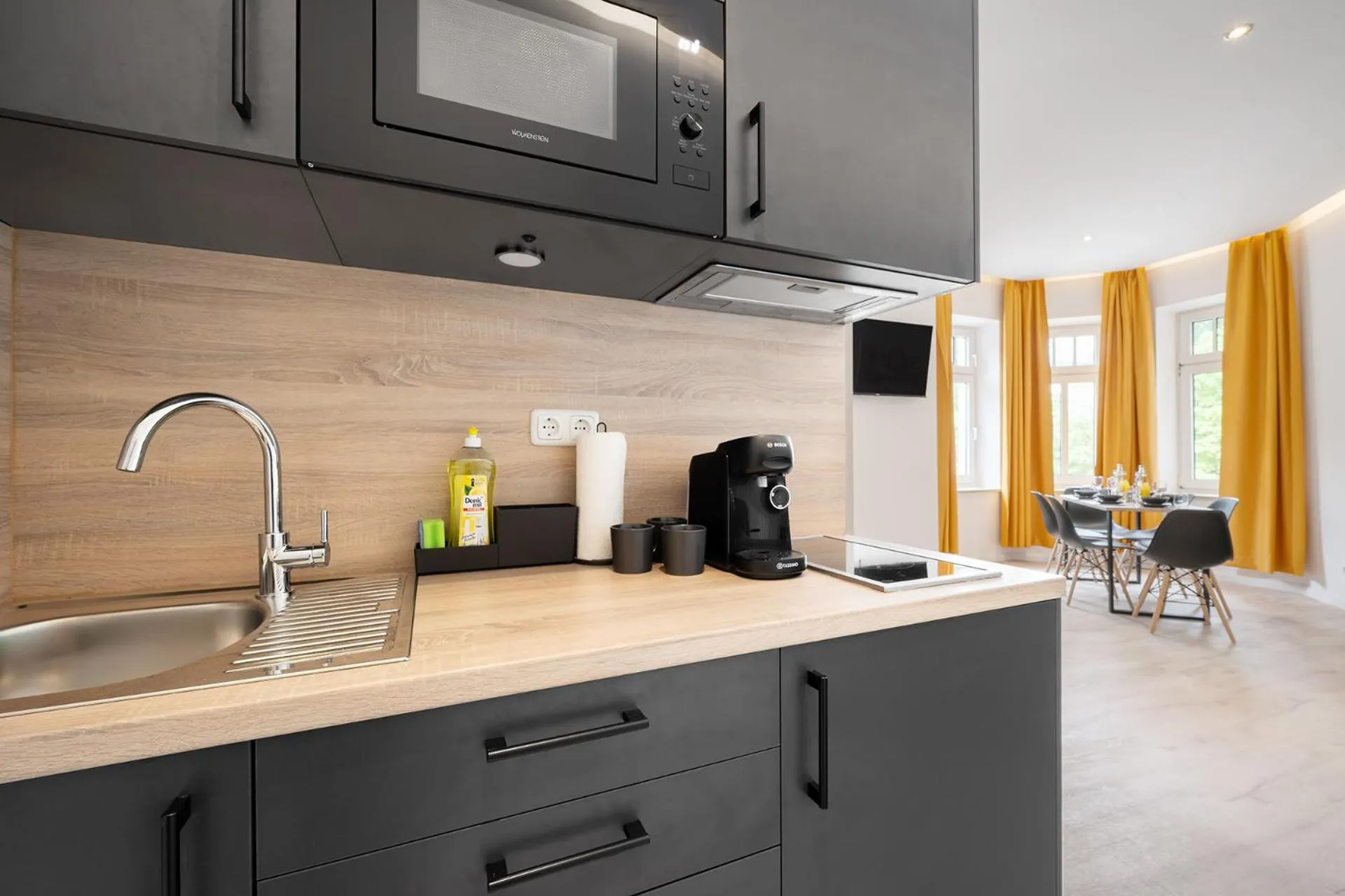 Kitchen or kitchenette in Servus Apartments by Homaris
