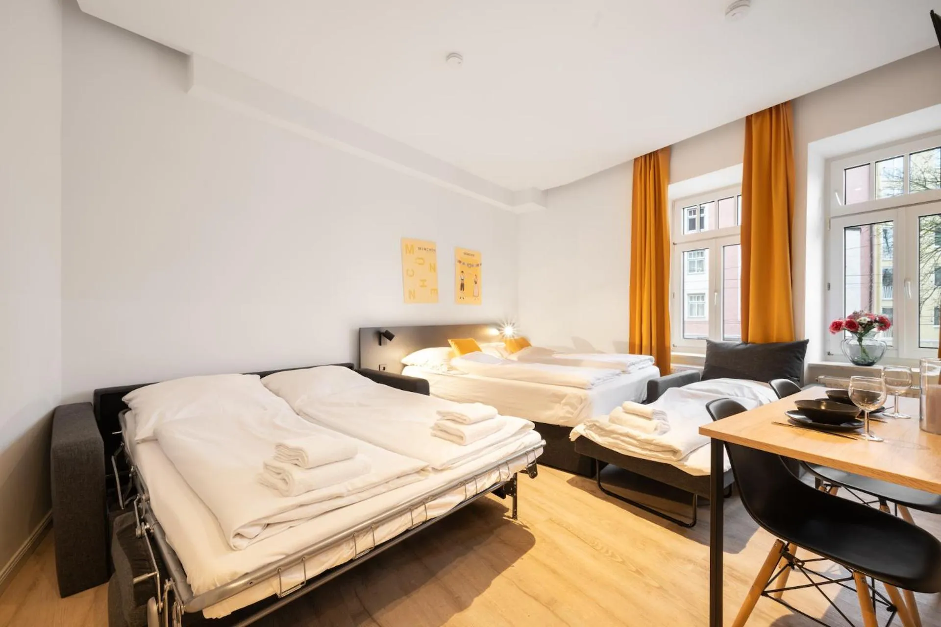 Bed in Servus Apartments by Homaris